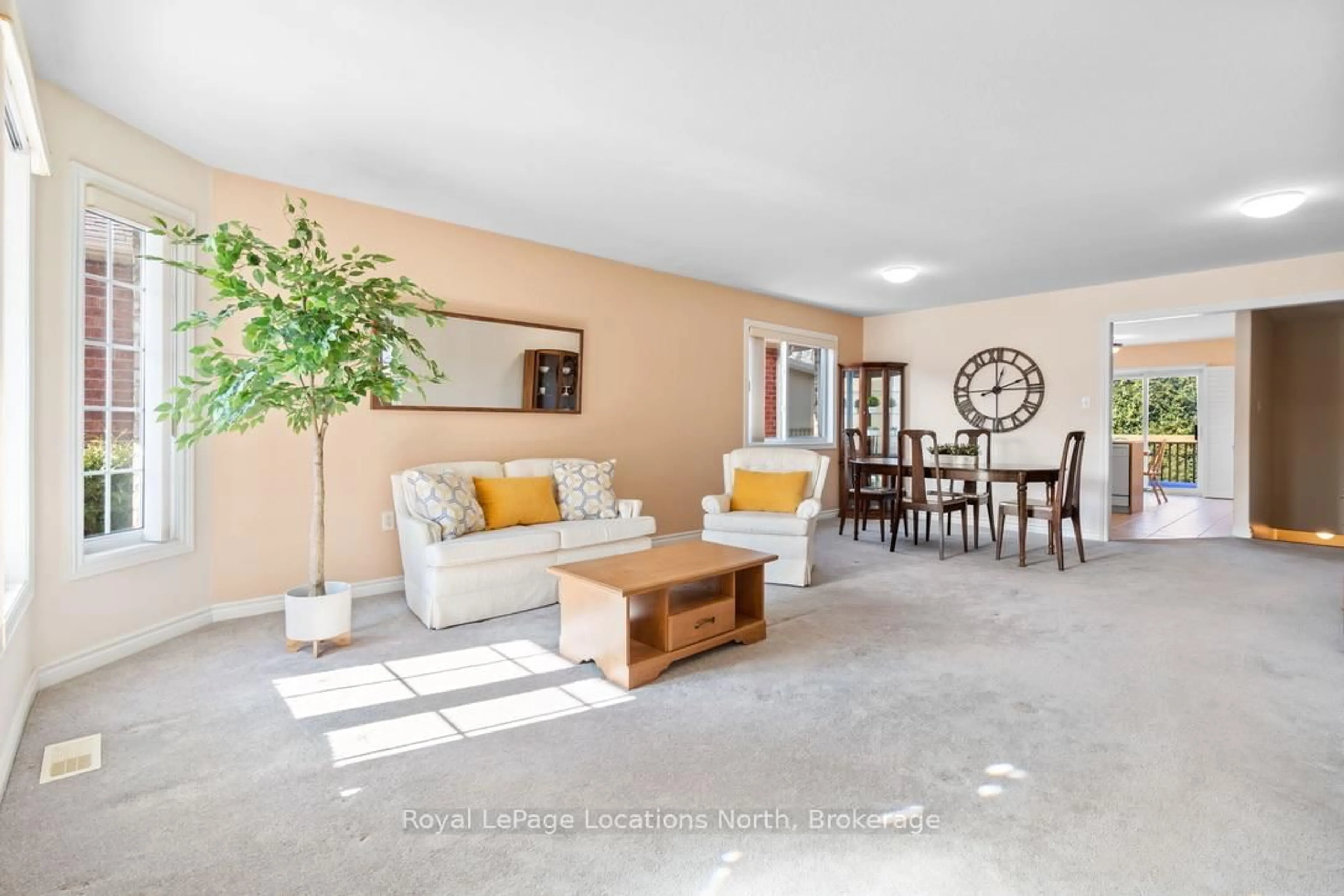 Living room with furniture, ceramic/tile floor for 83 White Elm Rd, Barrie Ontario L4N 0E4