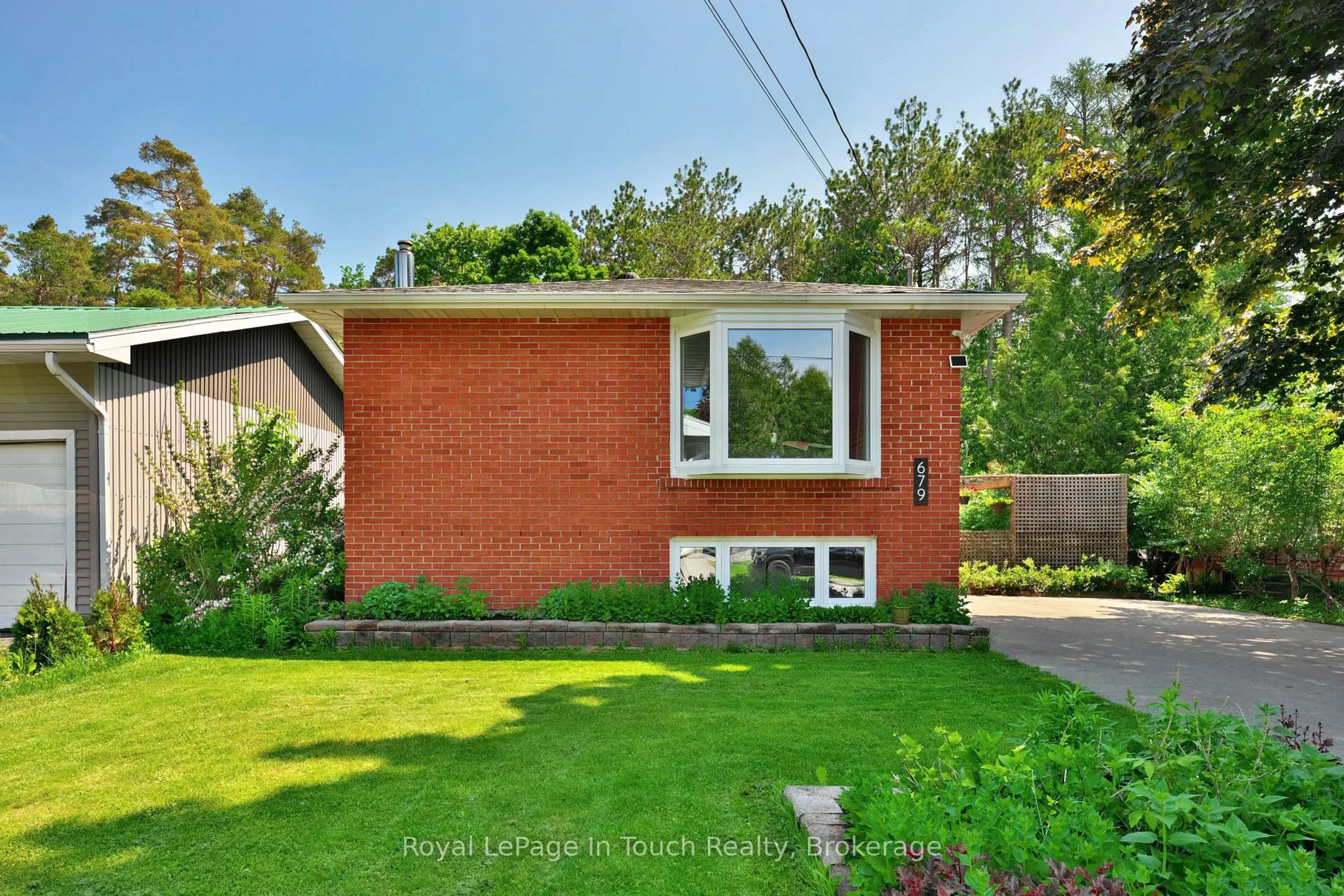 Home with brick exterior material, street for 679 Simcoe Ave, Tay Ontario L0K 1R0