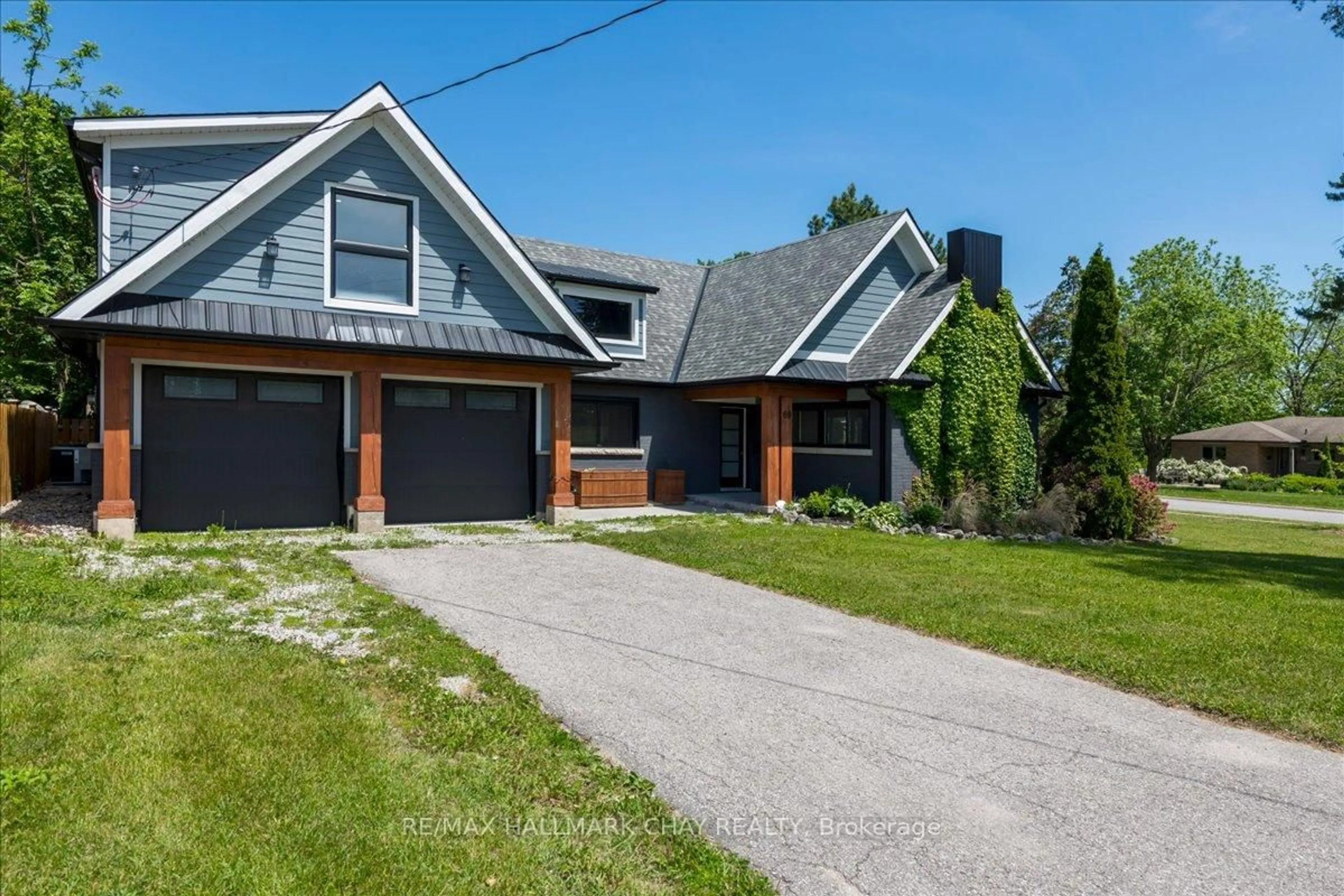 Home with brick exterior material, street for 69 Rodney St, Barrie Ontario L4M 4B8