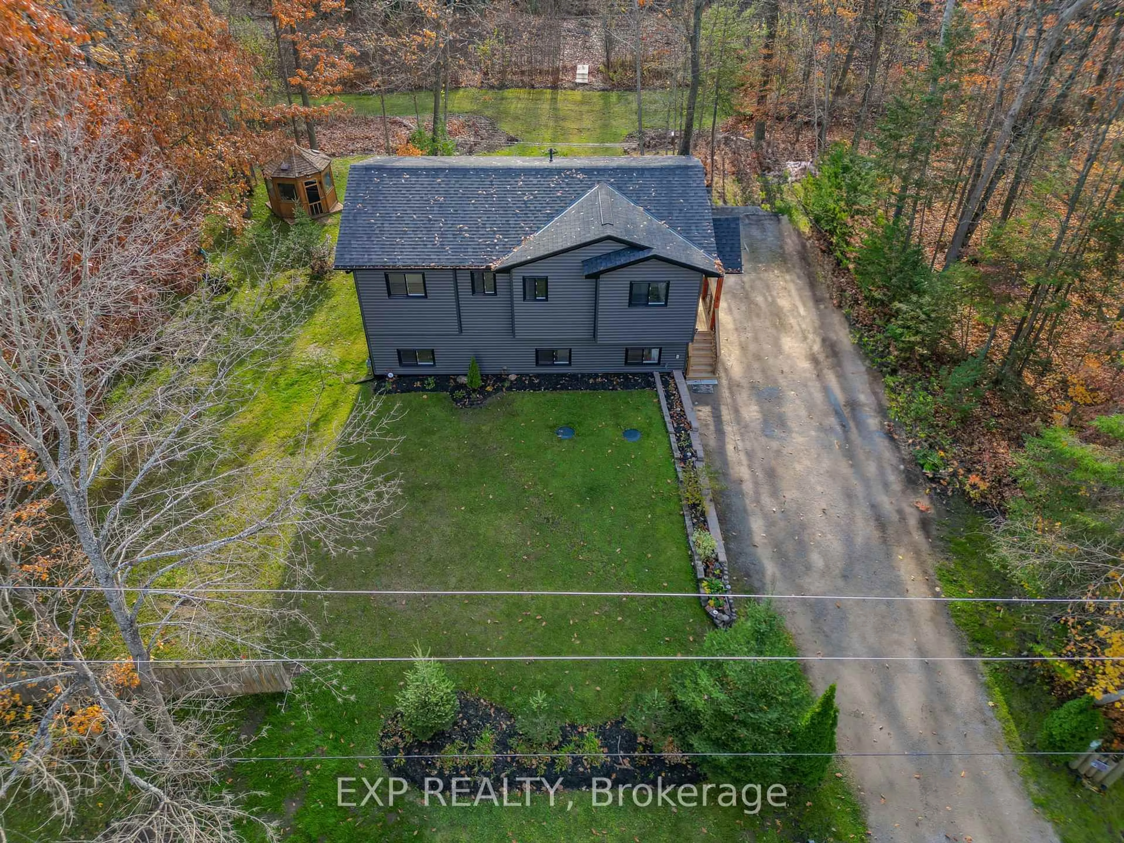A pic from outside/outdoor area/front of a property/back of a property/a pic from drone, water/lake/river/ocean view for 39 Becketts Sdrd, Tay Ontario L0K 2C0
