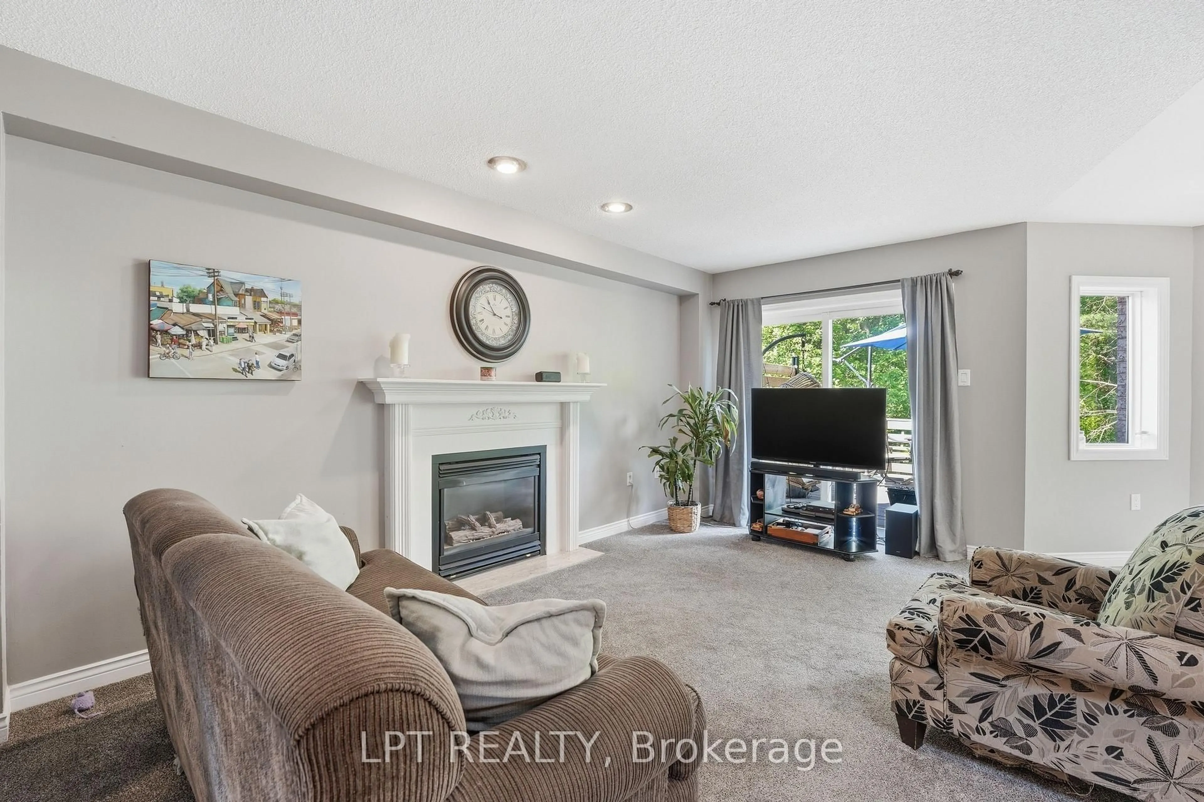 Living room with furniture, ceramic/tile floor for 24 Snowshoe Tr, Barrie Ontario L4N 7Z1
