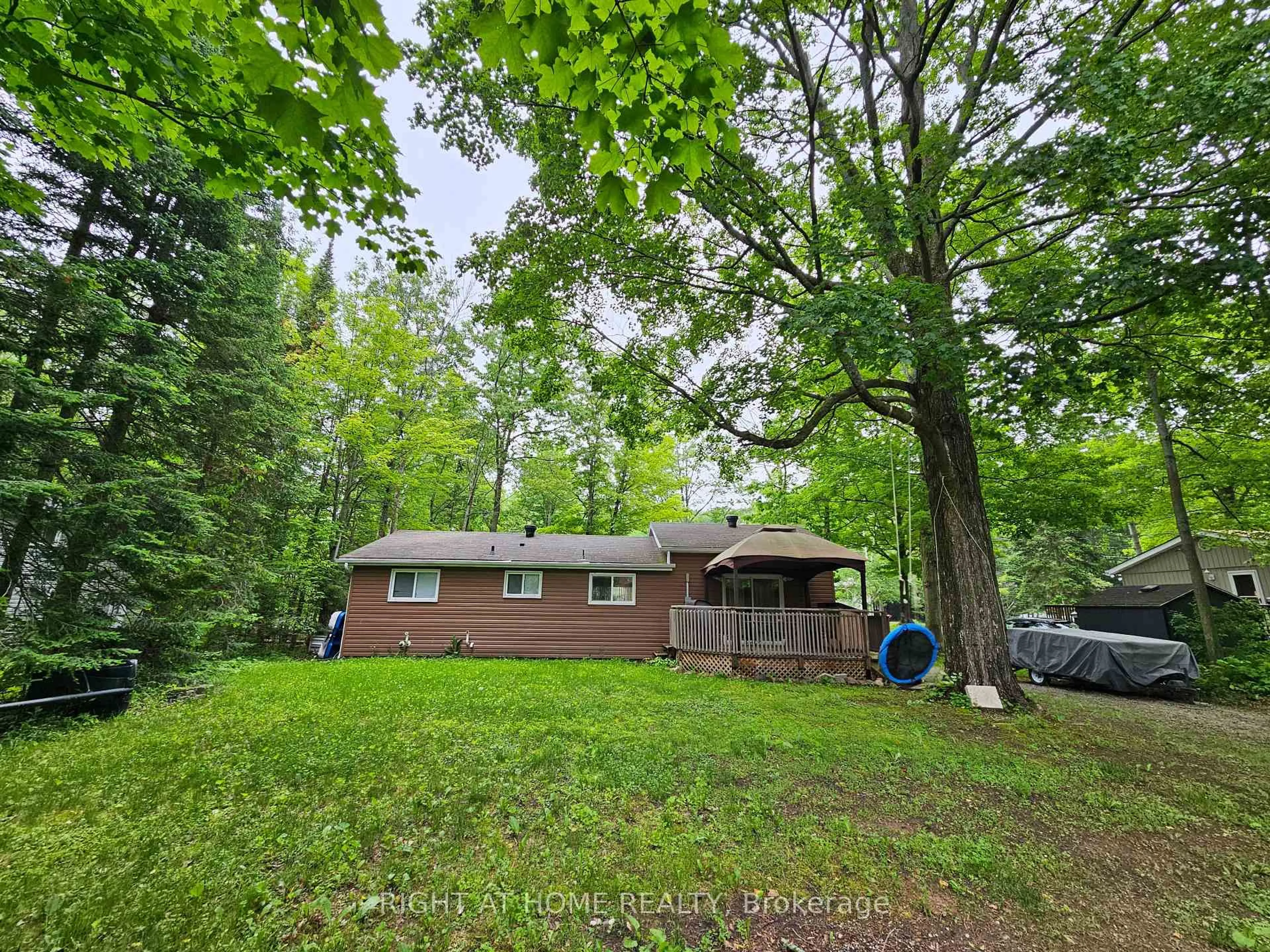 A pic from outside/outdoor area/front of a property/back of a property/a pic from drone, forest/trees view for 45 Heda Dr, Tiny Ontario L9M 0B3