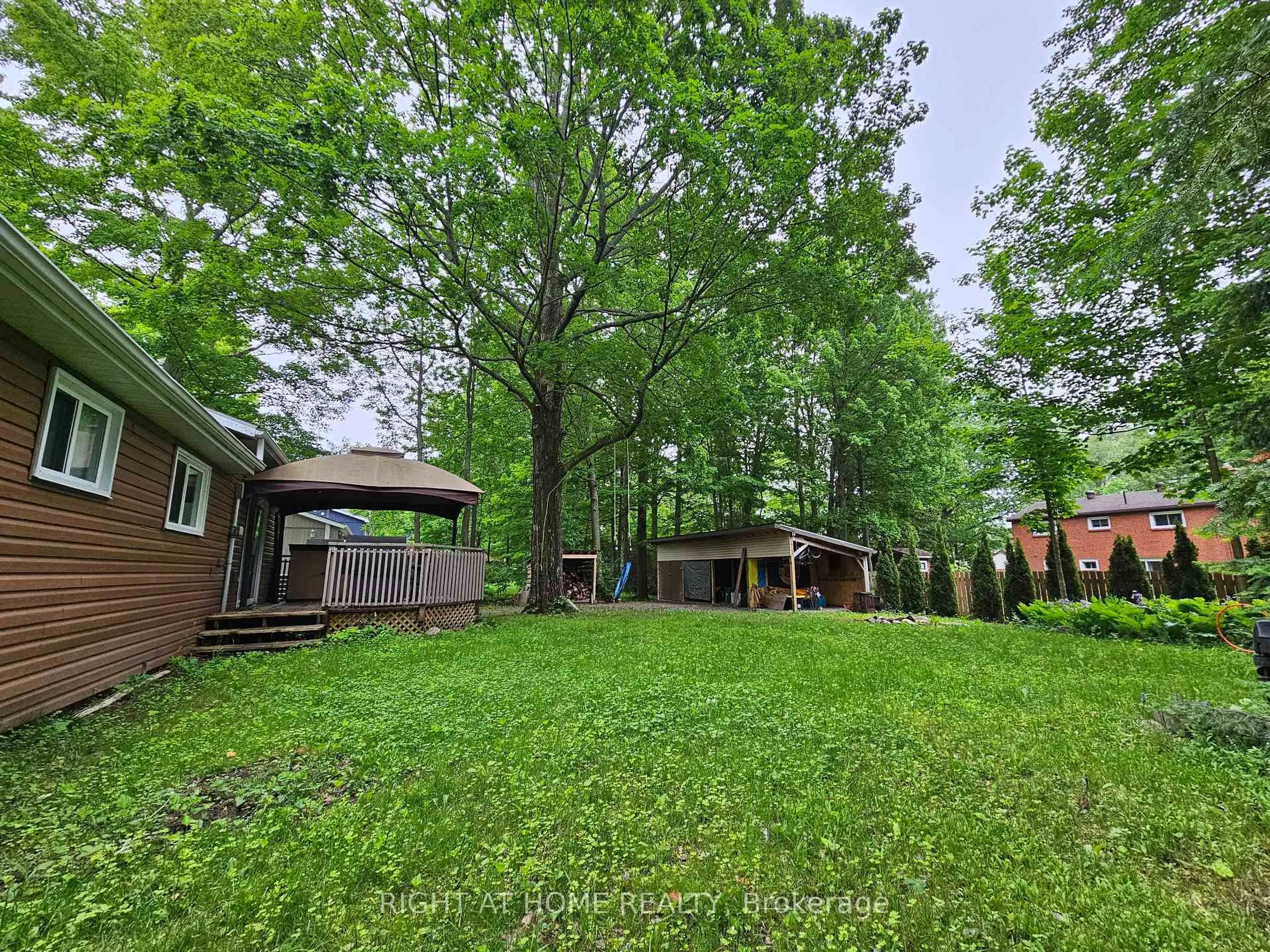 A pic from outside/outdoor area/front of a property/back of a property/a pic from drone, forest/trees view for 45 Heda Dr, Tiny Ontario L9M 0B3
