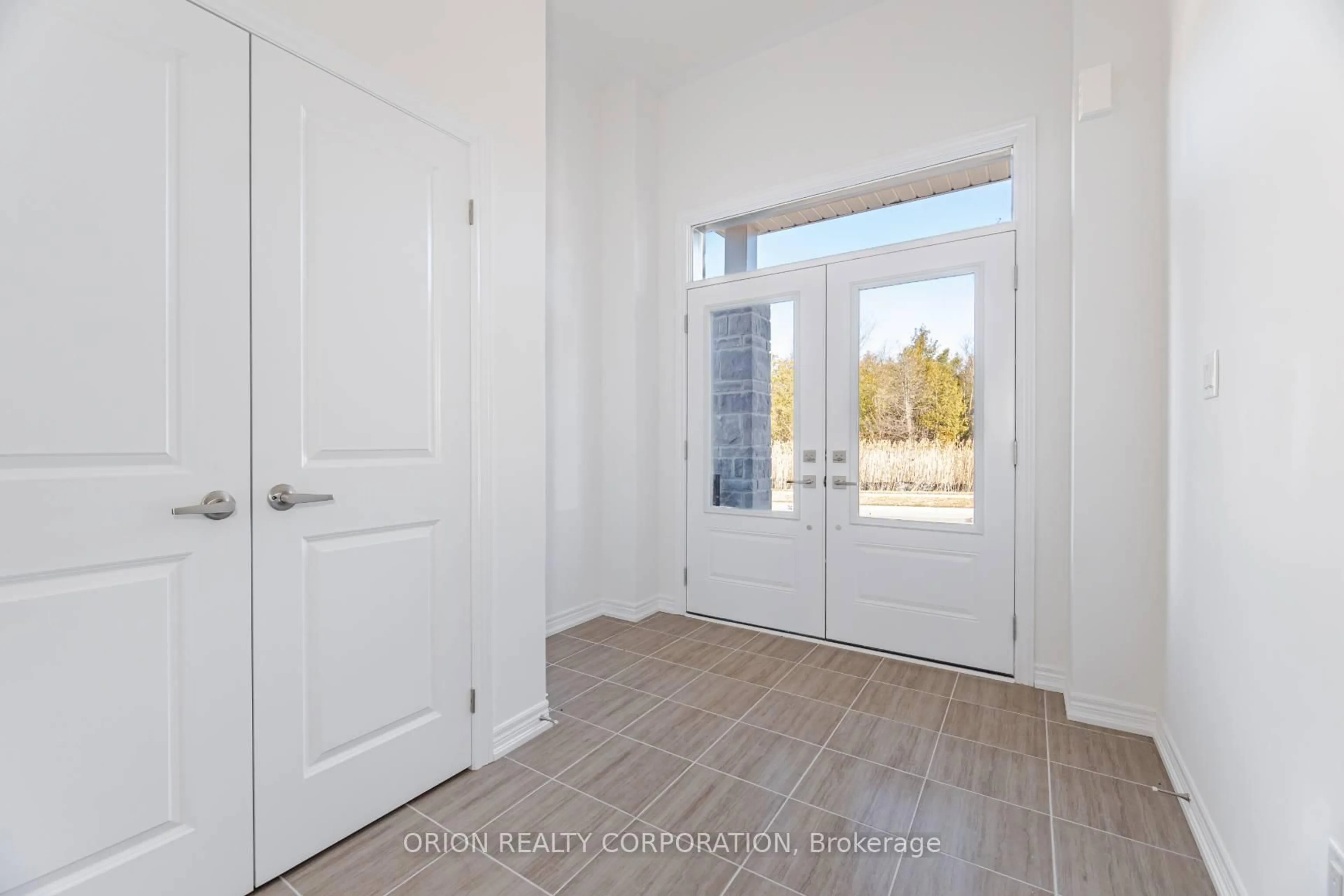 Indoor entryway for 65 Thicketwood Ave, Barrie Ontario L9L 0X4