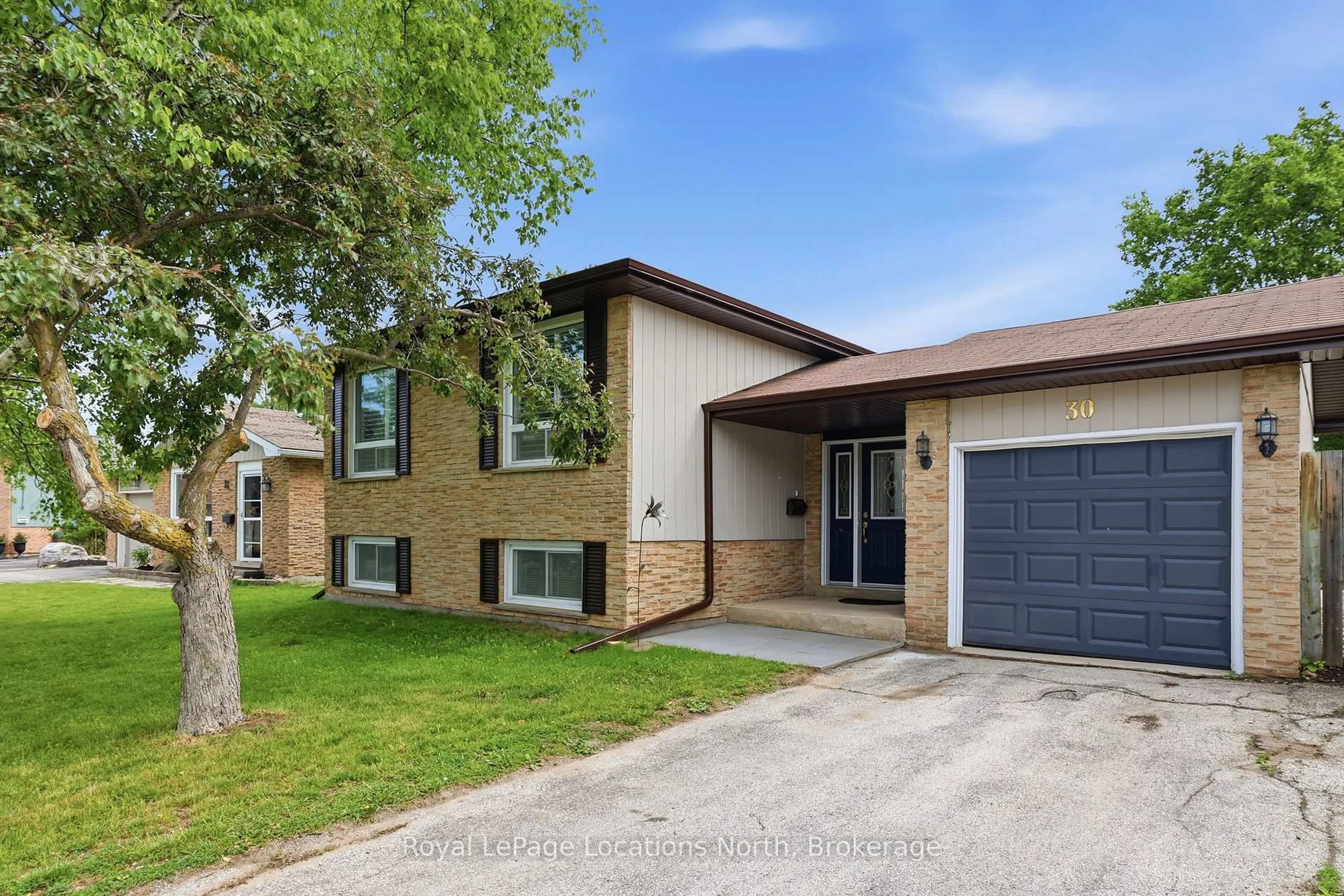 Home with brick exterior material, street for 30 Courtice Cres, Collingwood Ontario L9Y 4G1
