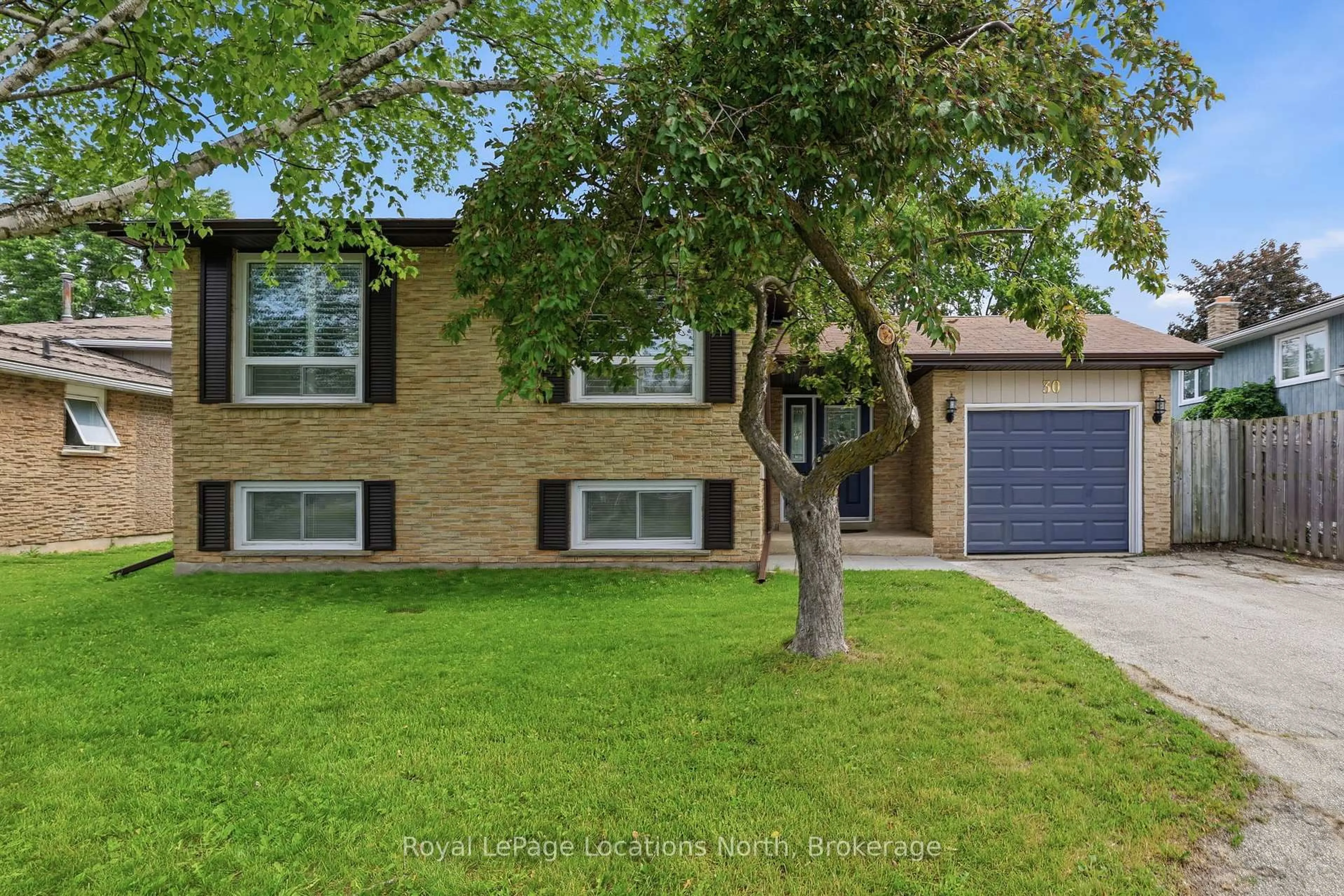 Home with brick exterior material, street for 30 Courtice Cres, Collingwood Ontario L9Y 4G1