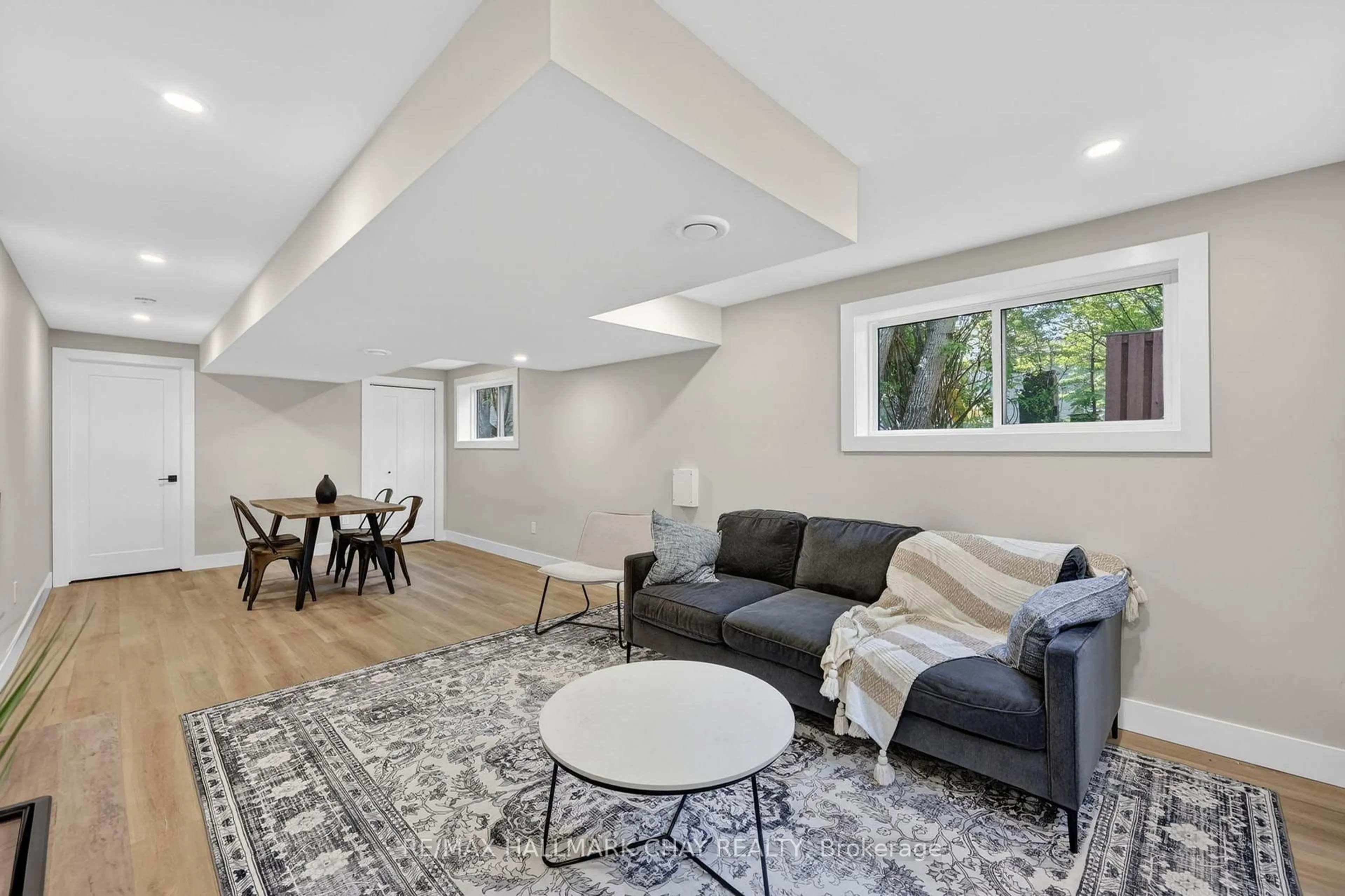 Living room with furniture, unknown for 8717 Beachwood Rd, Wasaga Beach Ontario L9Z 2G5