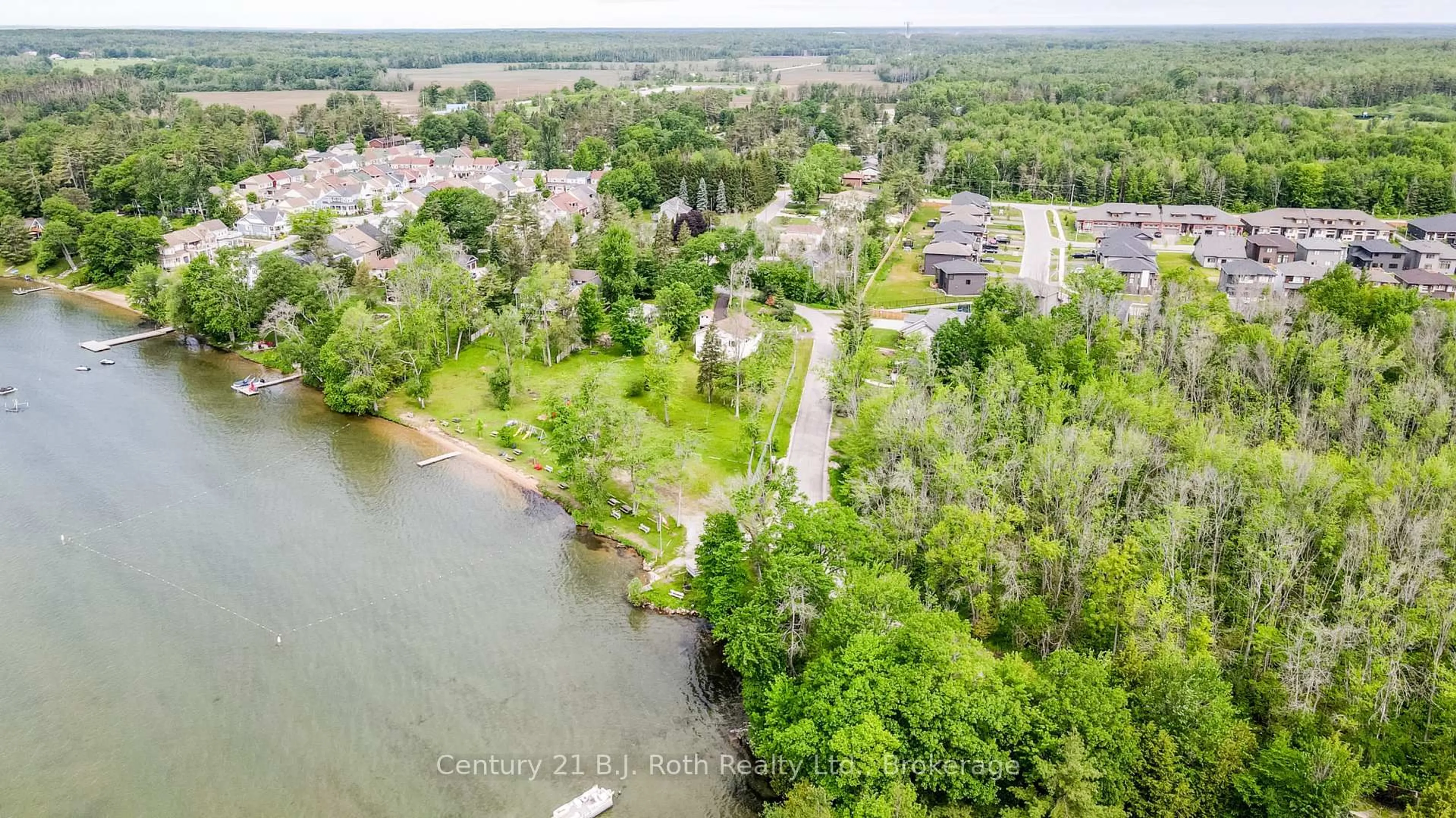 A pic from outside/outdoor area/front of a property/back of a property/a pic from drone, water/lake/river/ocean view for 3332 Grayshott Dr, Severn Ontario L3V 0Y4