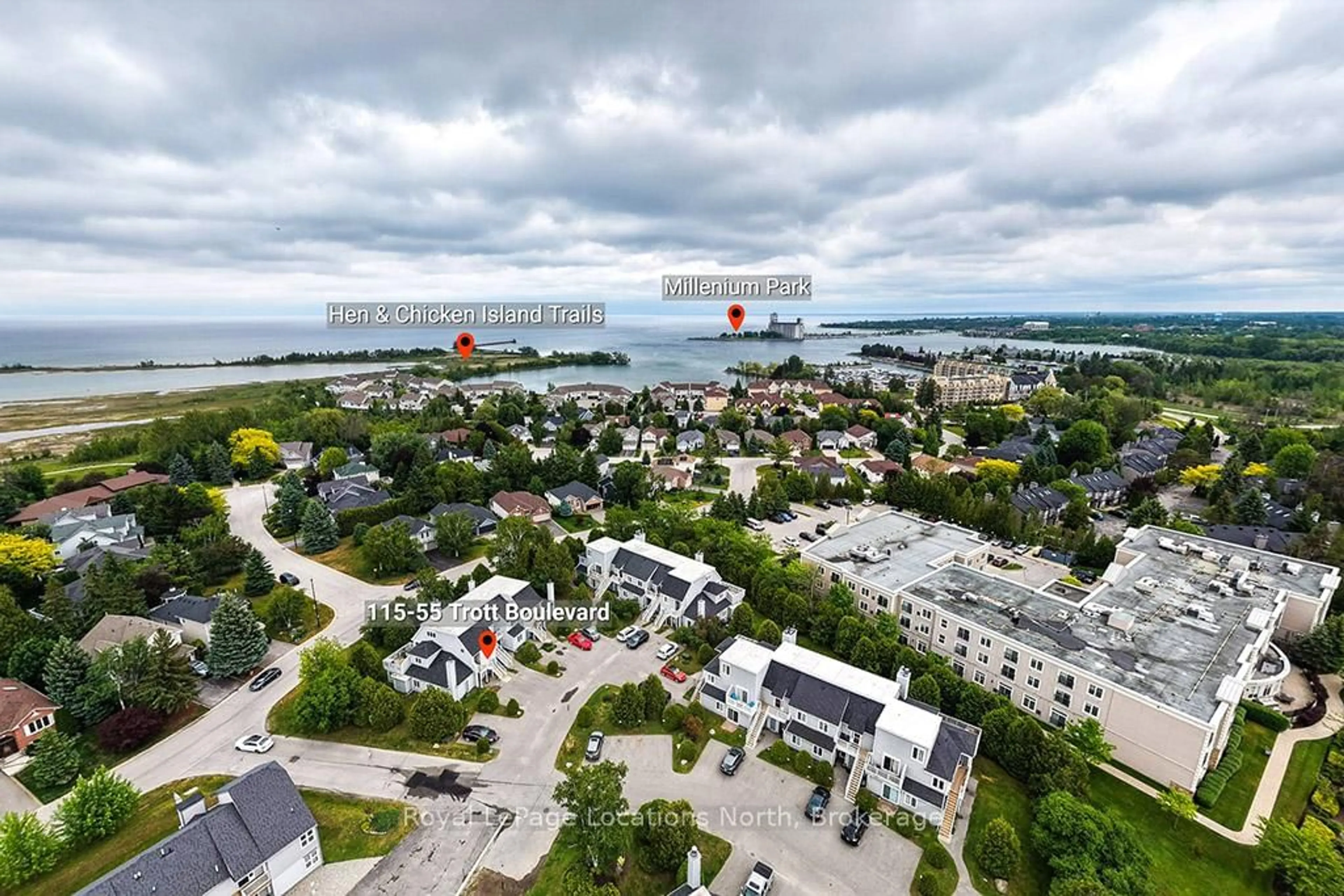 A pic from outside/outdoor area/front of a property/back of a property/a pic from drone, city buildings view from balcony for 55 Trott Blvd #115, Collingwood Ontario L9Y 4B8
