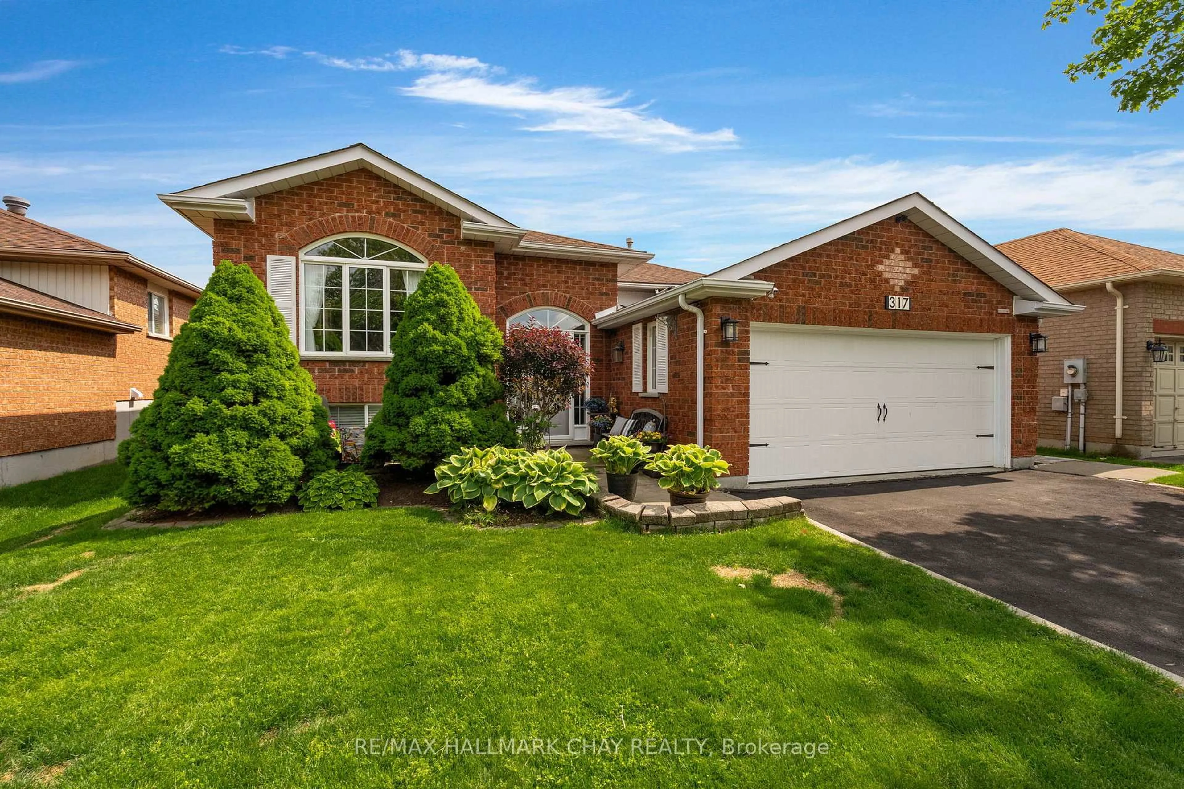Home with brick exterior material, street for 317 Harvie Rd, Barrie Ontario L4N 8J5