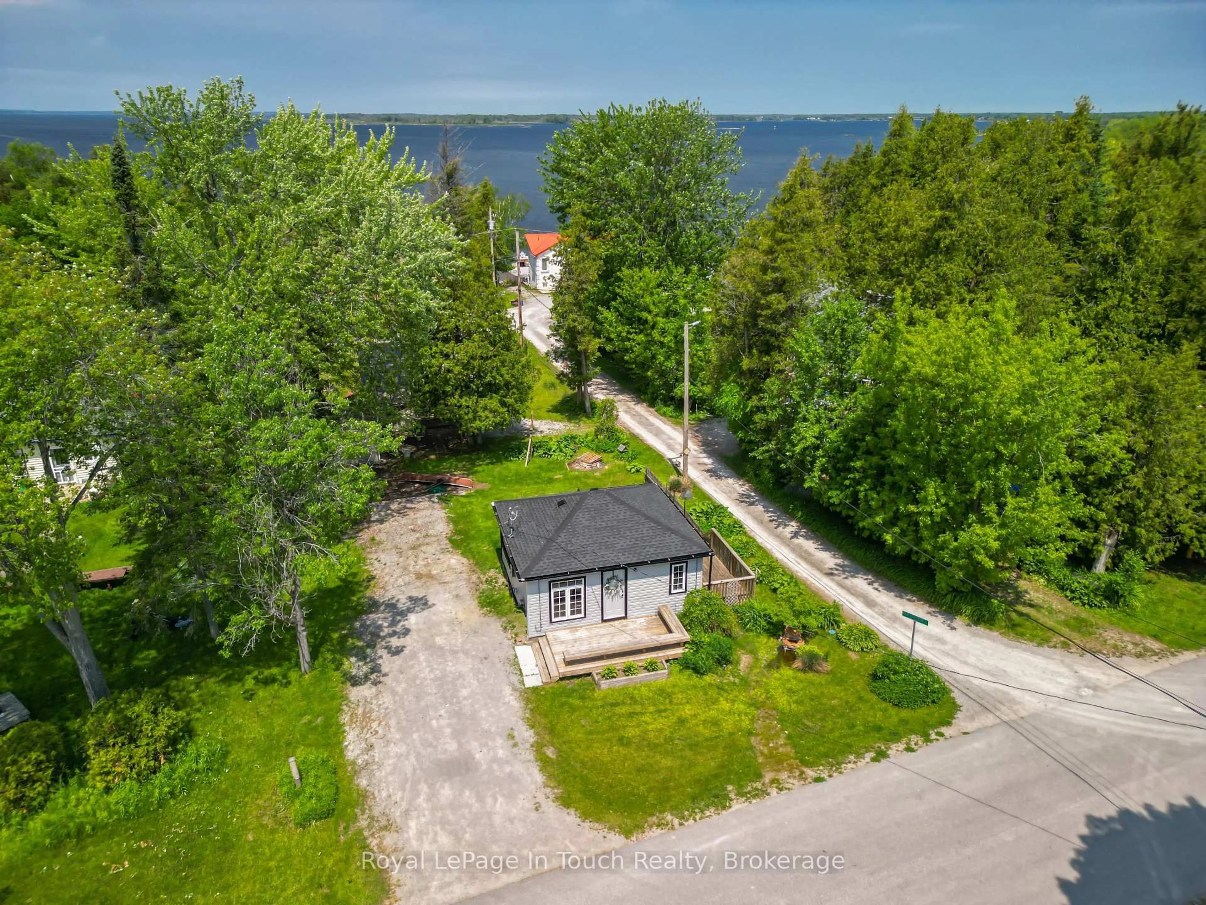 A pic from outside/outdoor area/front of a property/back of a property/a pic from drone, water/lake/river/ocean view for 78 KING RD, Tay Ontario L0K 2C0