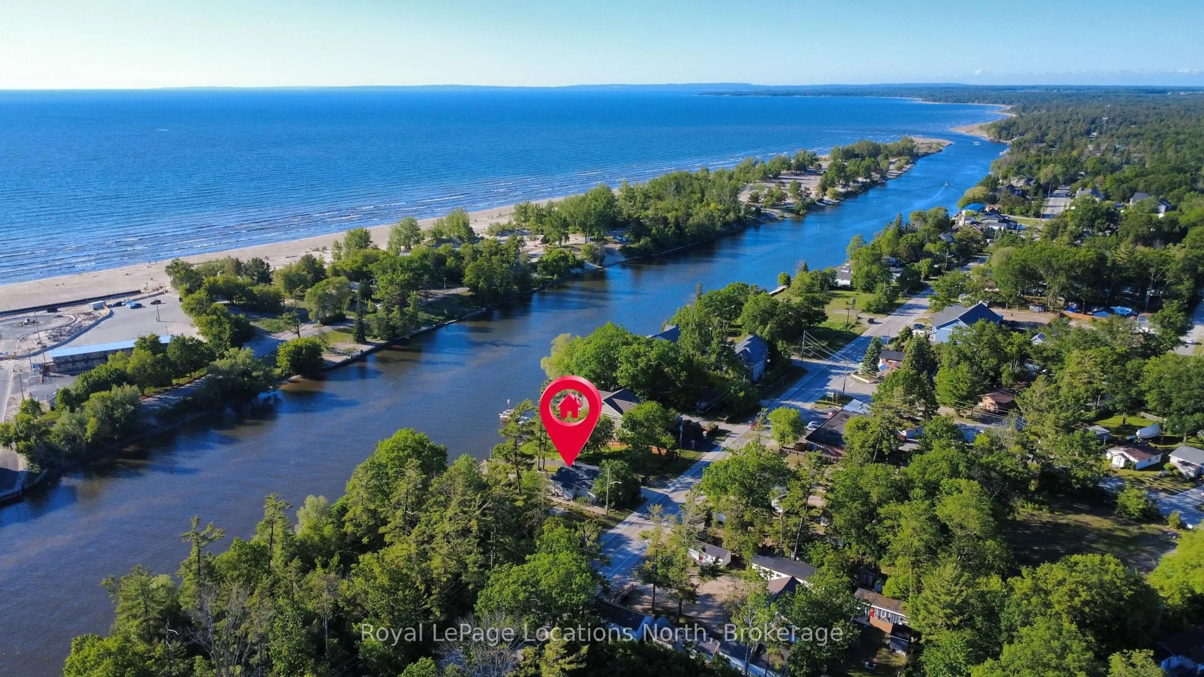 A pic from outside/outdoor area/front of a property/back of a property/a pic from drone, water/lake/river/ocean view for 32 River Rd, Wasaga Beach Ontario L9Z 2L1
