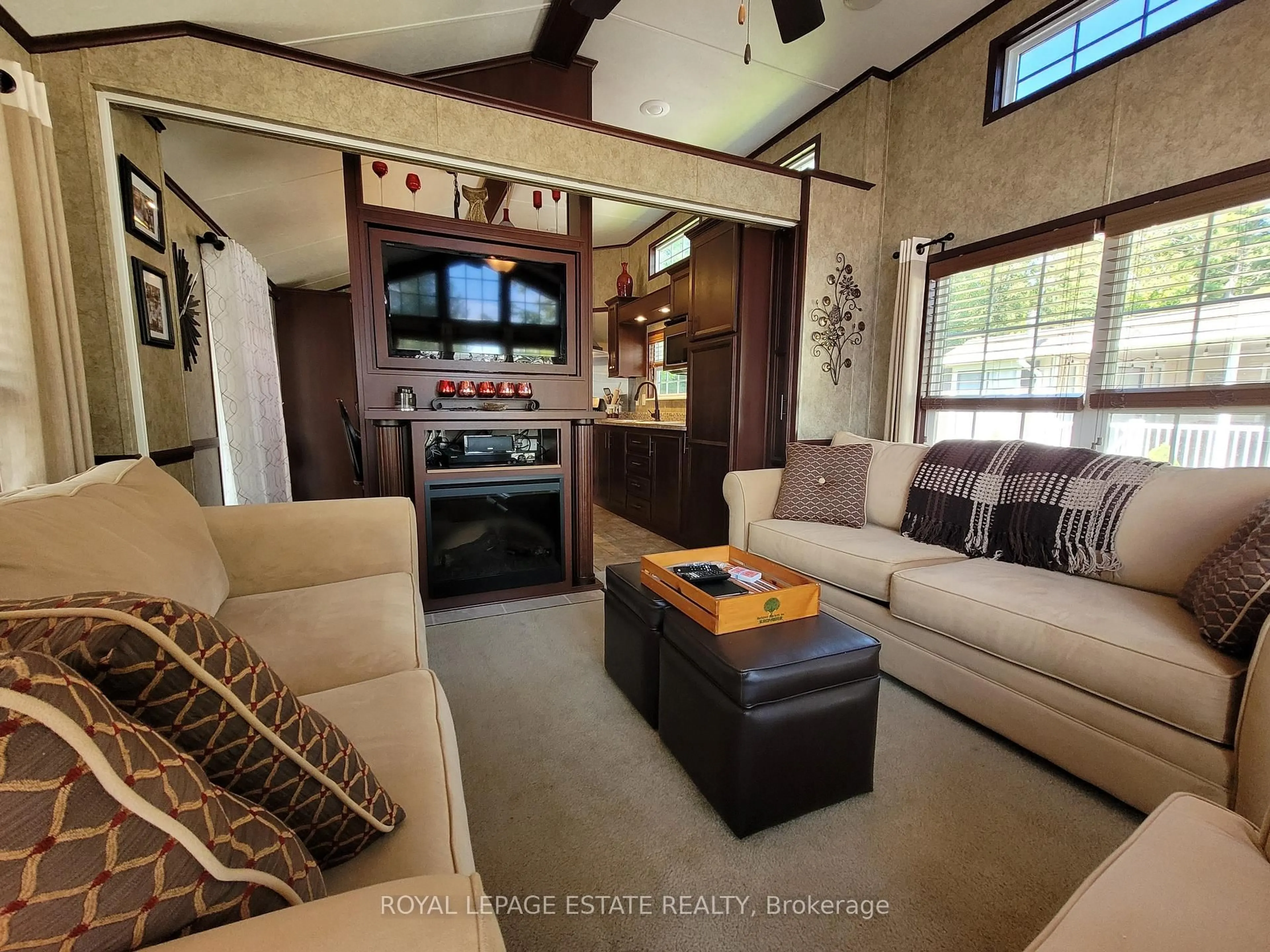 Living room with furniture, unknown for 127 Madawaska Tr, Wasaga Beach Ontario L9Z 1X7