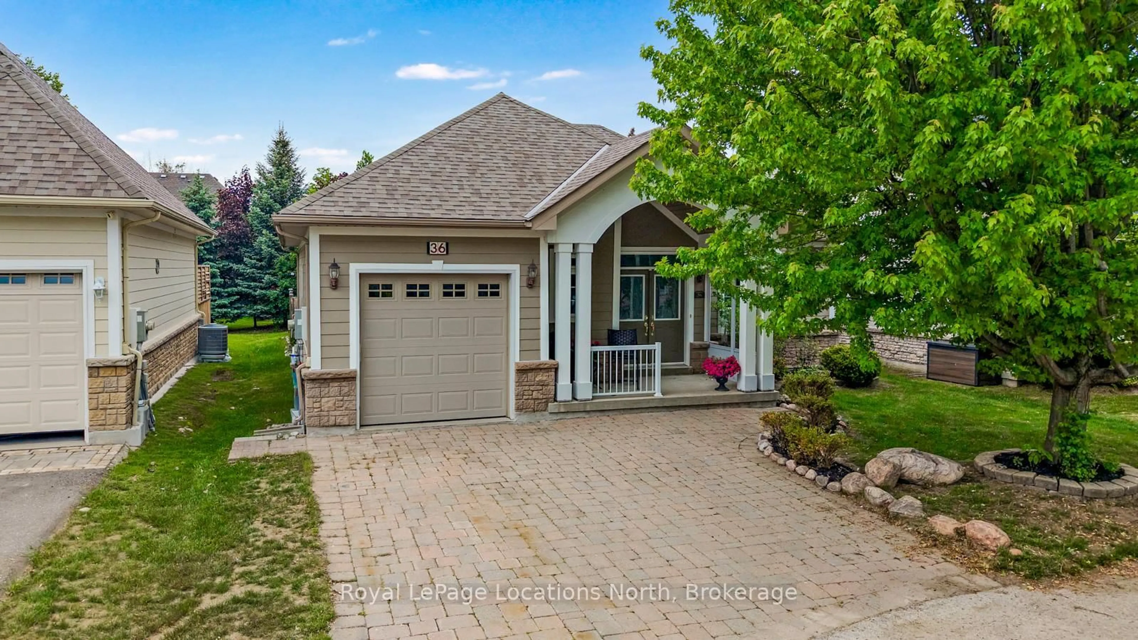 Home with brick exterior material, street for 36 CLUBHOUSE Dr, Collingwood Ontario L9Y 4Z6