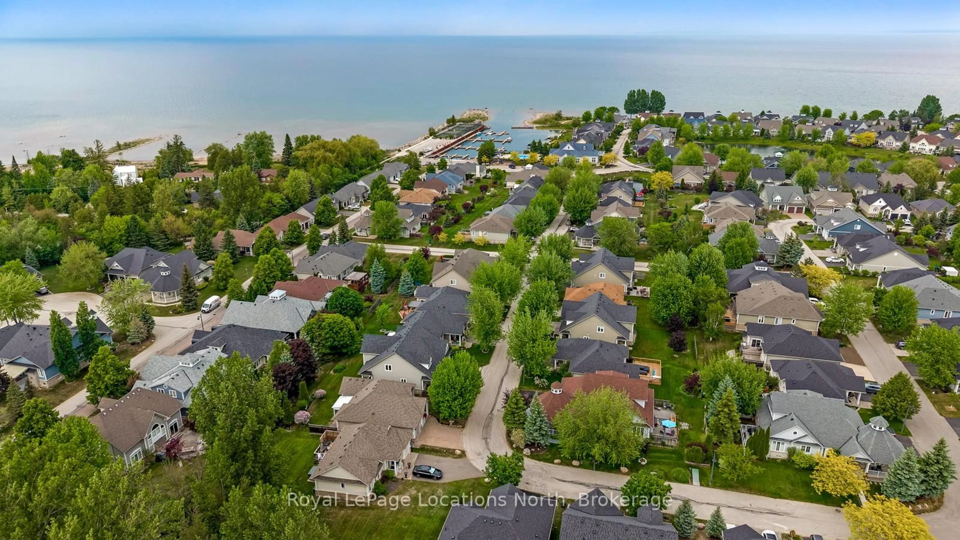 A pic from outside/outdoor area/front of a property/back of a property/a pic from drone, water/lake/river/ocean view for 36 CLUBHOUSE Dr, Collingwood Ontario L9Y 4Z6