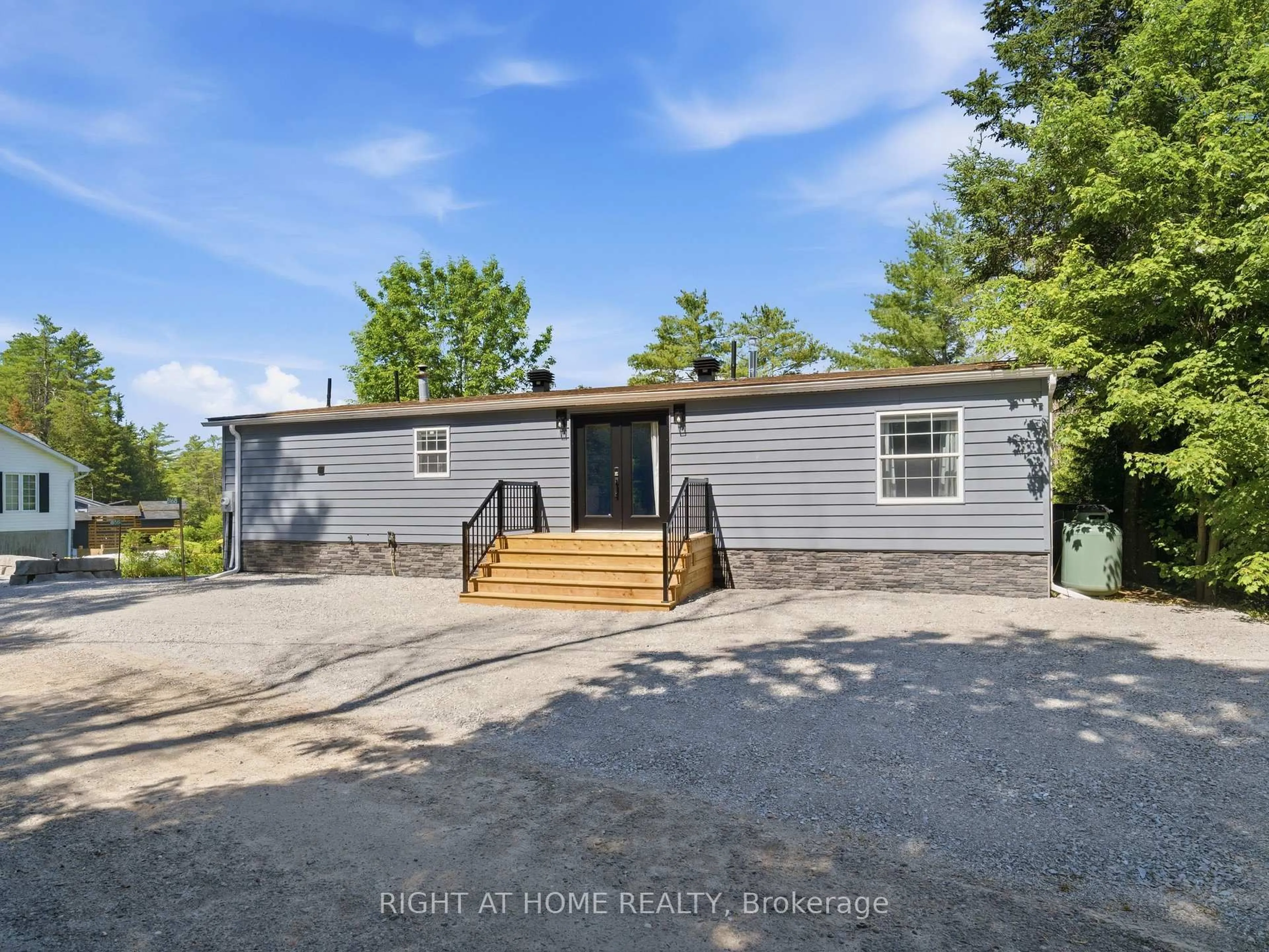 A pic from outside/outdoor area/front of a property/back of a property/a pic from drone, street for 8168 Laidlaw Ave, Ramara Ontario L0K 2B0