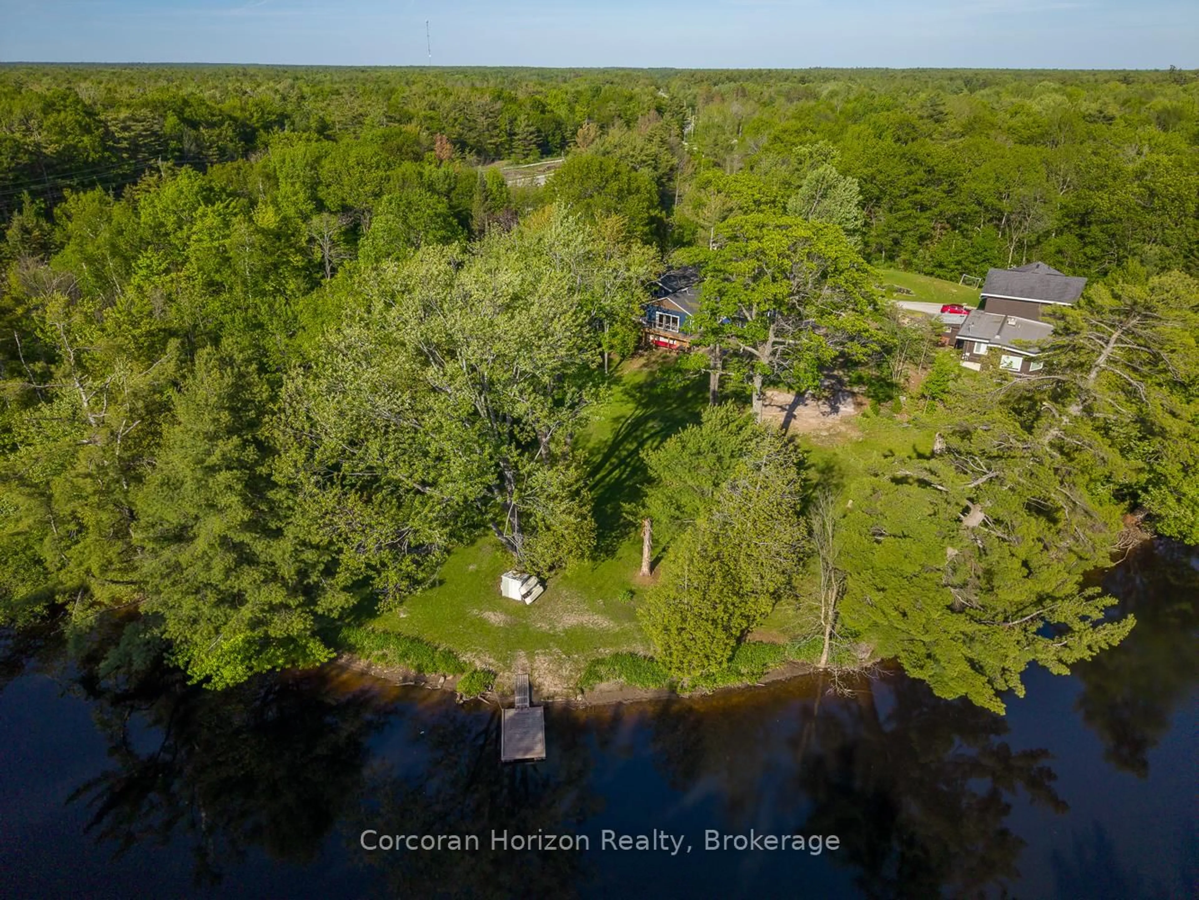 A pic from outside/outdoor area/front of a property/back of a property/a pic from drone, water/lake/river/ocean view for 3000 Whelan Way, Ramara Ontario L0K 2B0