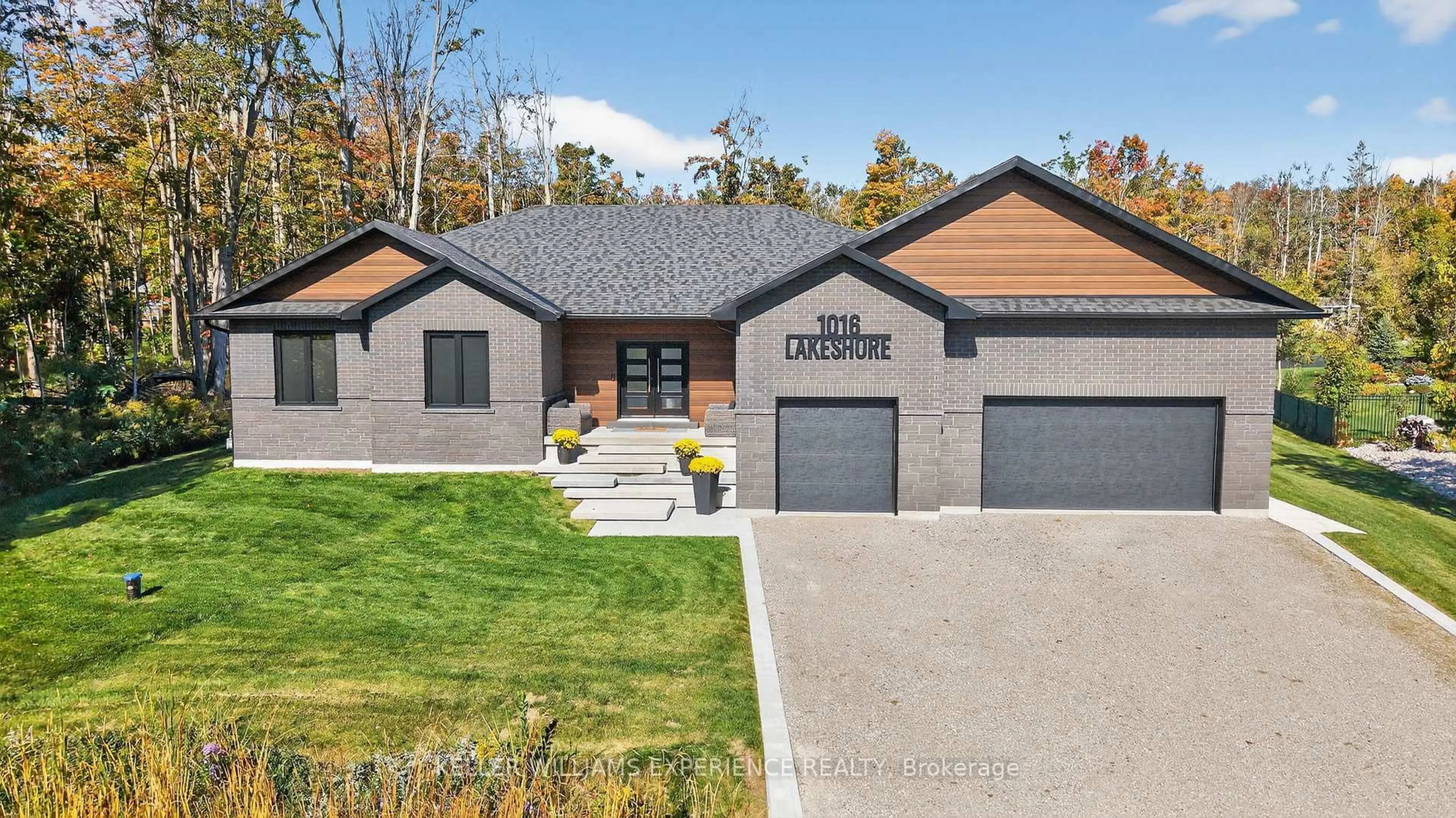 Home with brick exterior material, street for 1016 Lakeshore Rd, Oro-Medonte Ontario L0L 1T0