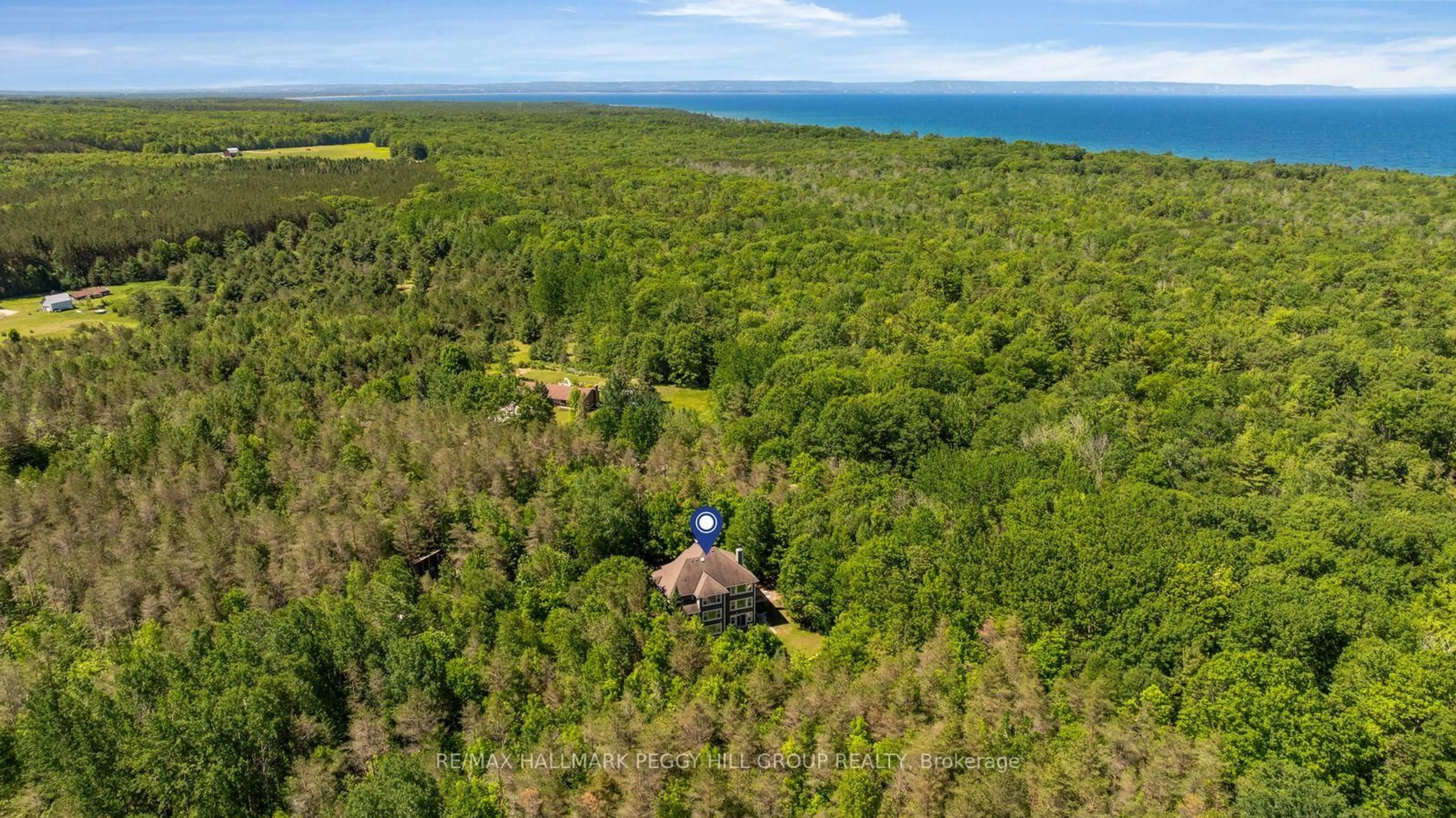 A pic from outside/outdoor area/front of a property/back of a property/a pic from drone, forest/trees view for 185 Skylark Rd, Tiny Ontario L0L 2T0