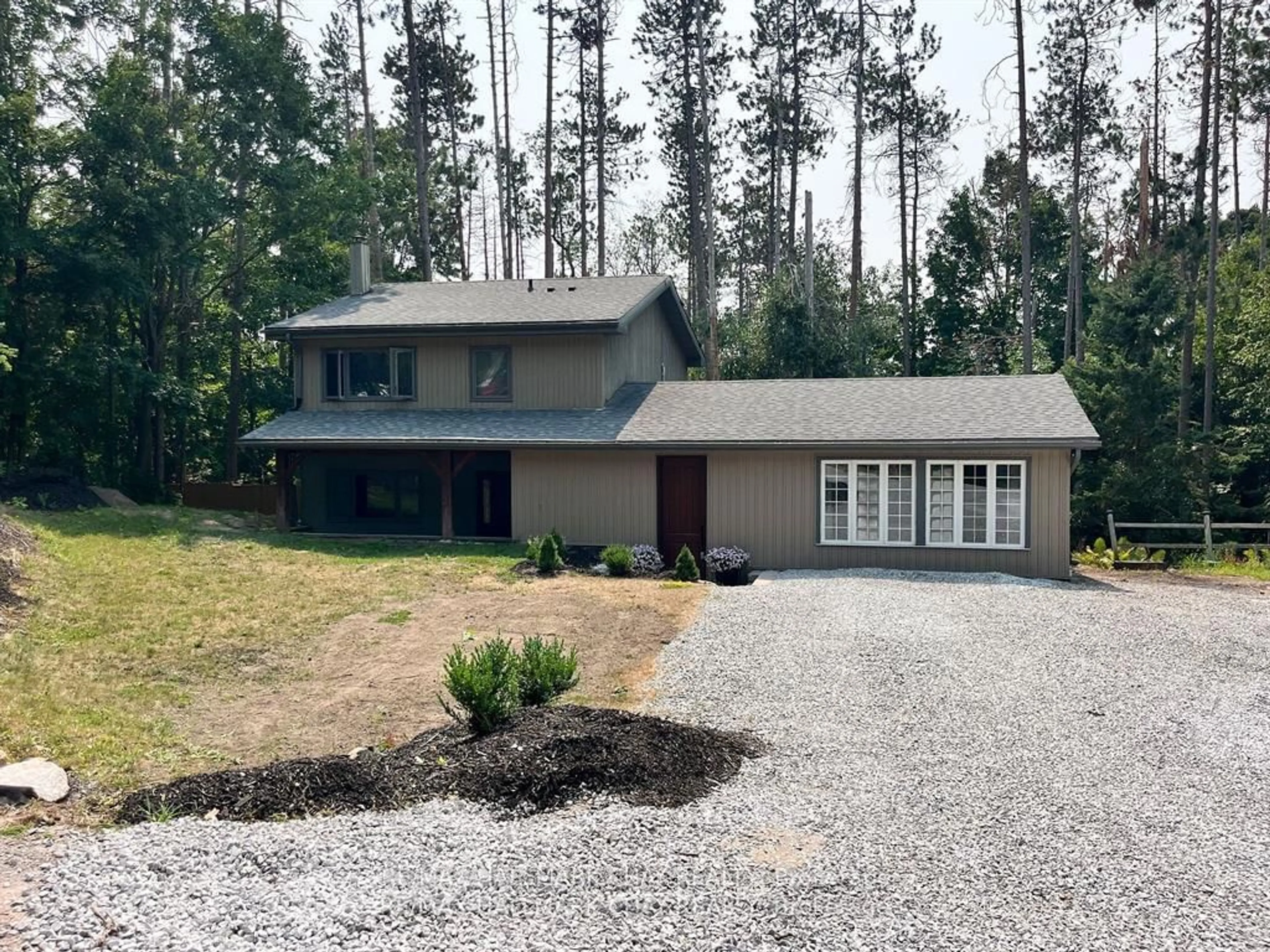 A pic from outside/outdoor area/front of a property/back of a property/a pic from drone, unknown for 1 Pine Spring Rd, Oro-Medonte Ontario L4M 4Y8