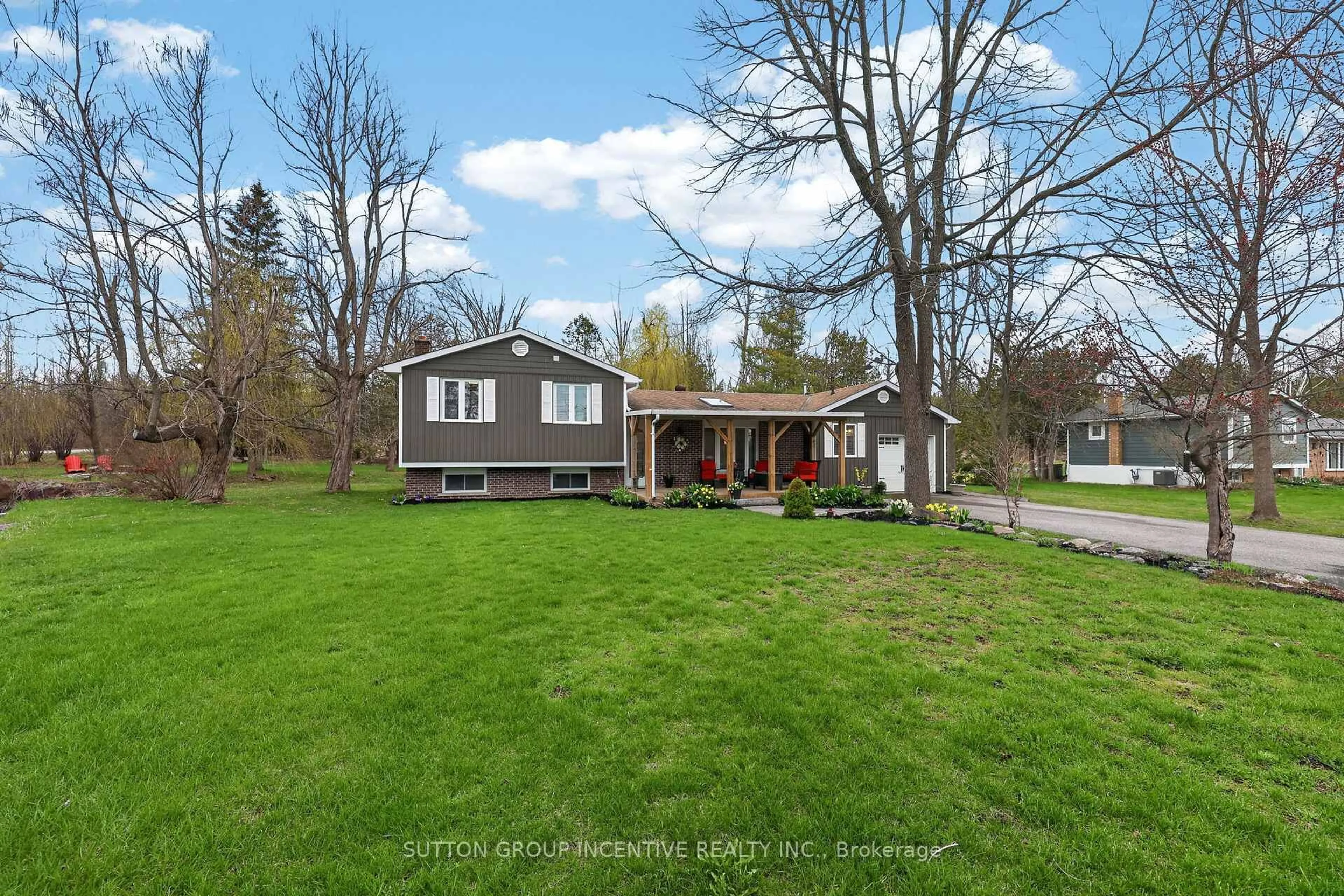 A pic from outside/outdoor area/front of a property/back of a property/a pic from drone, street for 10 Springhome Rd, Oro-Medonte Ontario L0L 1T0
