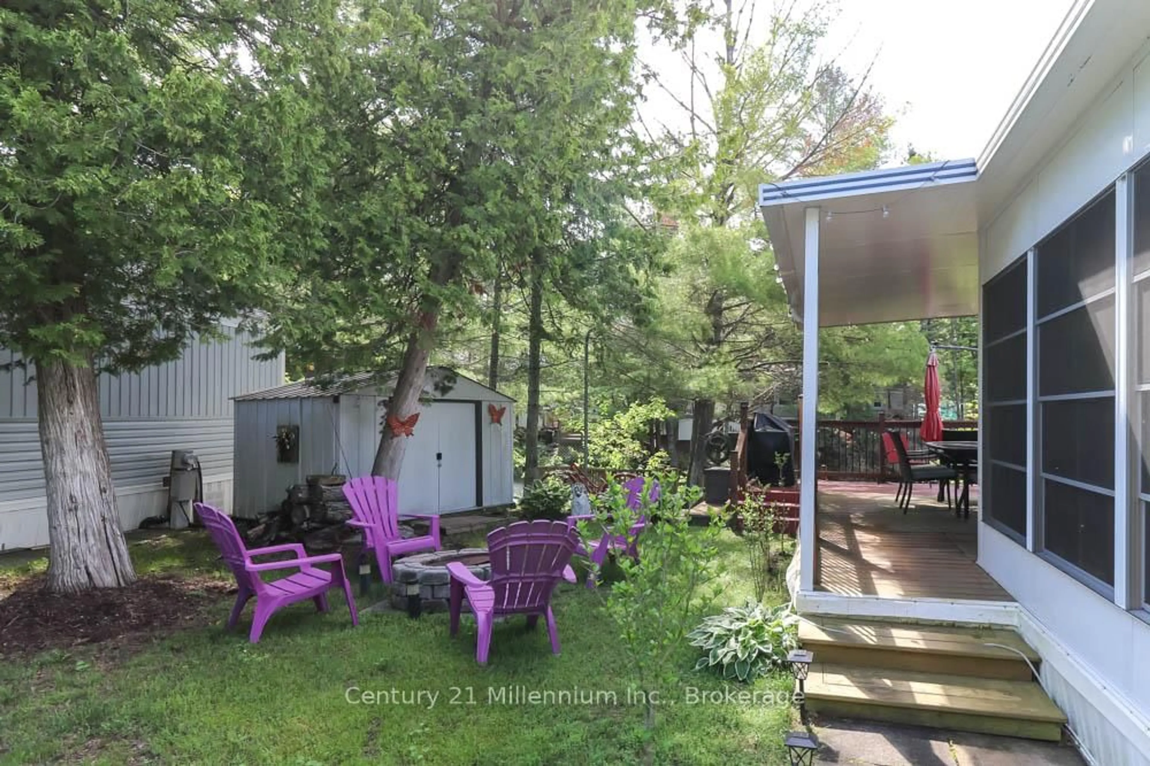 Patio, forest/trees view for 85 Theme Park Dr #45, Wasaga Beach Ontario L9Z 1X7