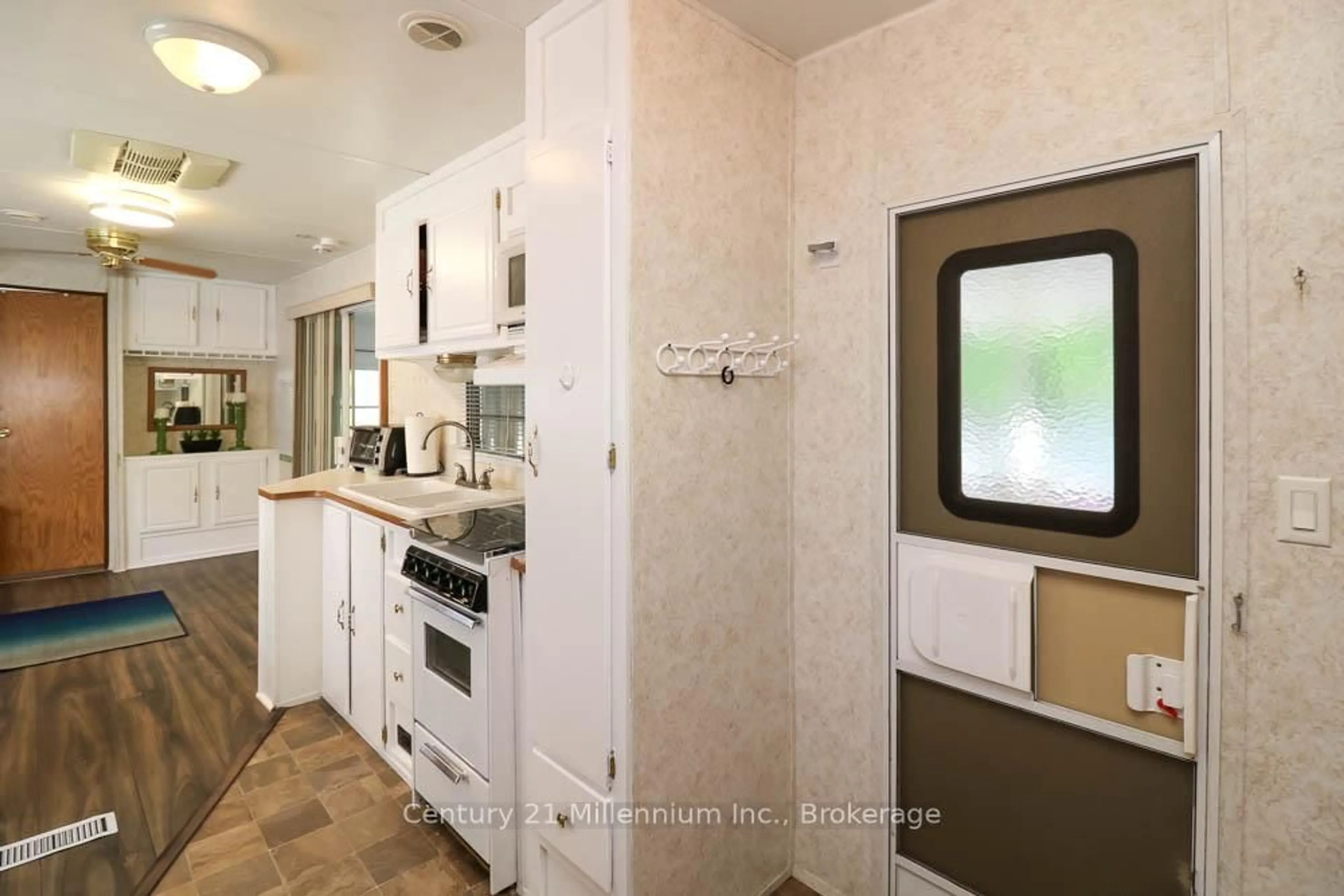 Standard kitchen, ceramic/tile floor for 85 Theme Park Dr #45, Wasaga Beach Ontario L9Z 1X7