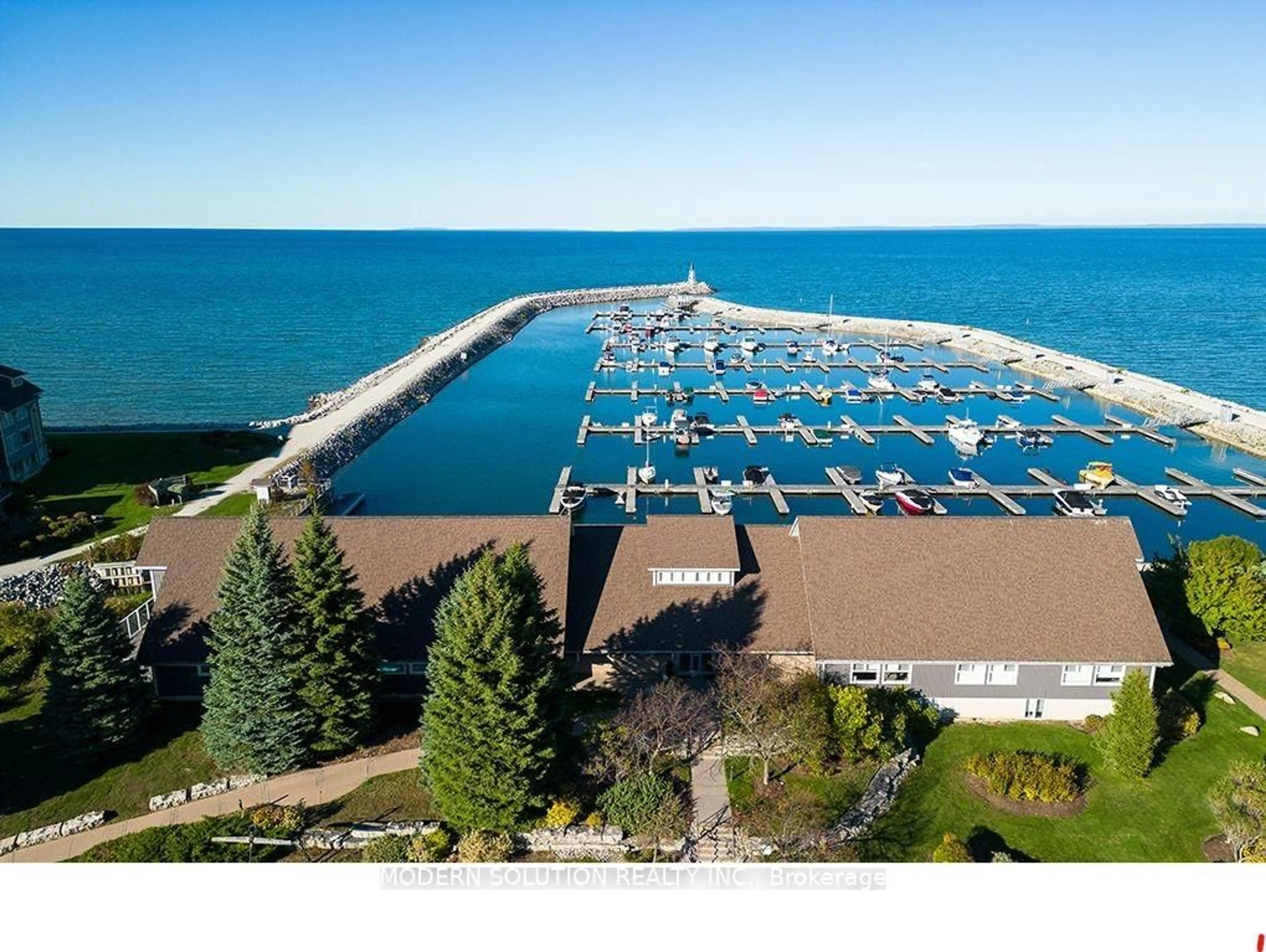 A pic from outside/outdoor area/front of a property/back of a property/a pic from drone, water/lake/river/ocean view for 307 Mariners Way, Collingwood Ontario L9Y 5C7