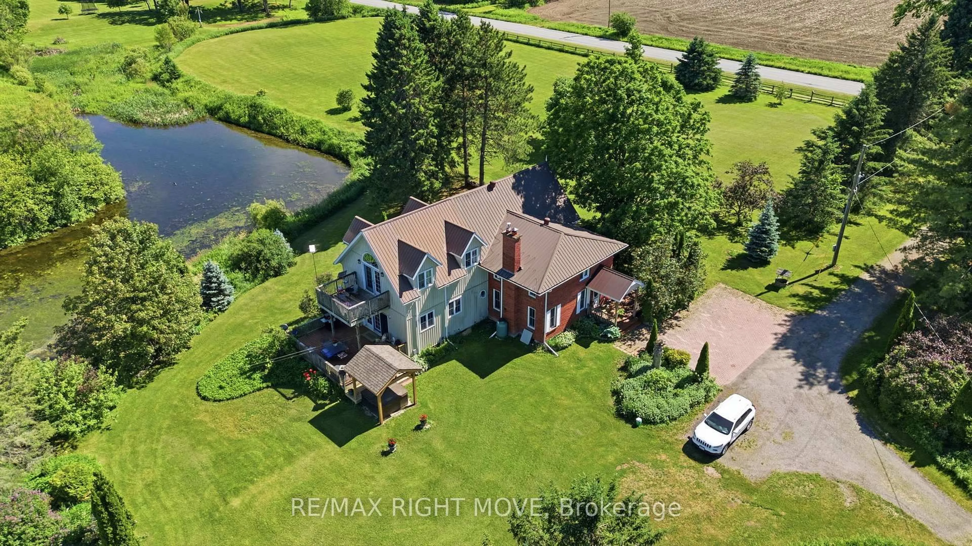 A pic from outside/outdoor area/front of a property/back of a property/a pic from drone, water/lake/river/ocean view for 4201 8 Line, Oro-Medonte Ontario L0K 1E0