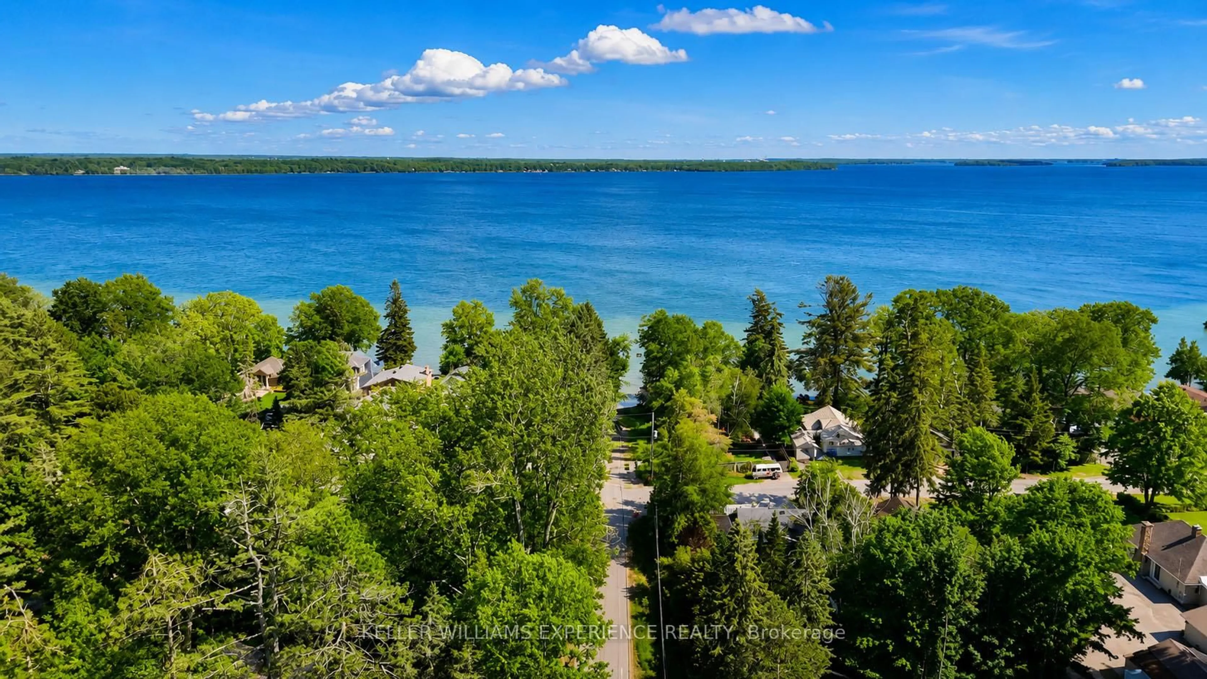 A pic from outside/outdoor area/front of a property/back of a property/a pic from drone, water/lake/river/ocean view for 3319 Knight Ave, Severn Ontario L3V 6H3