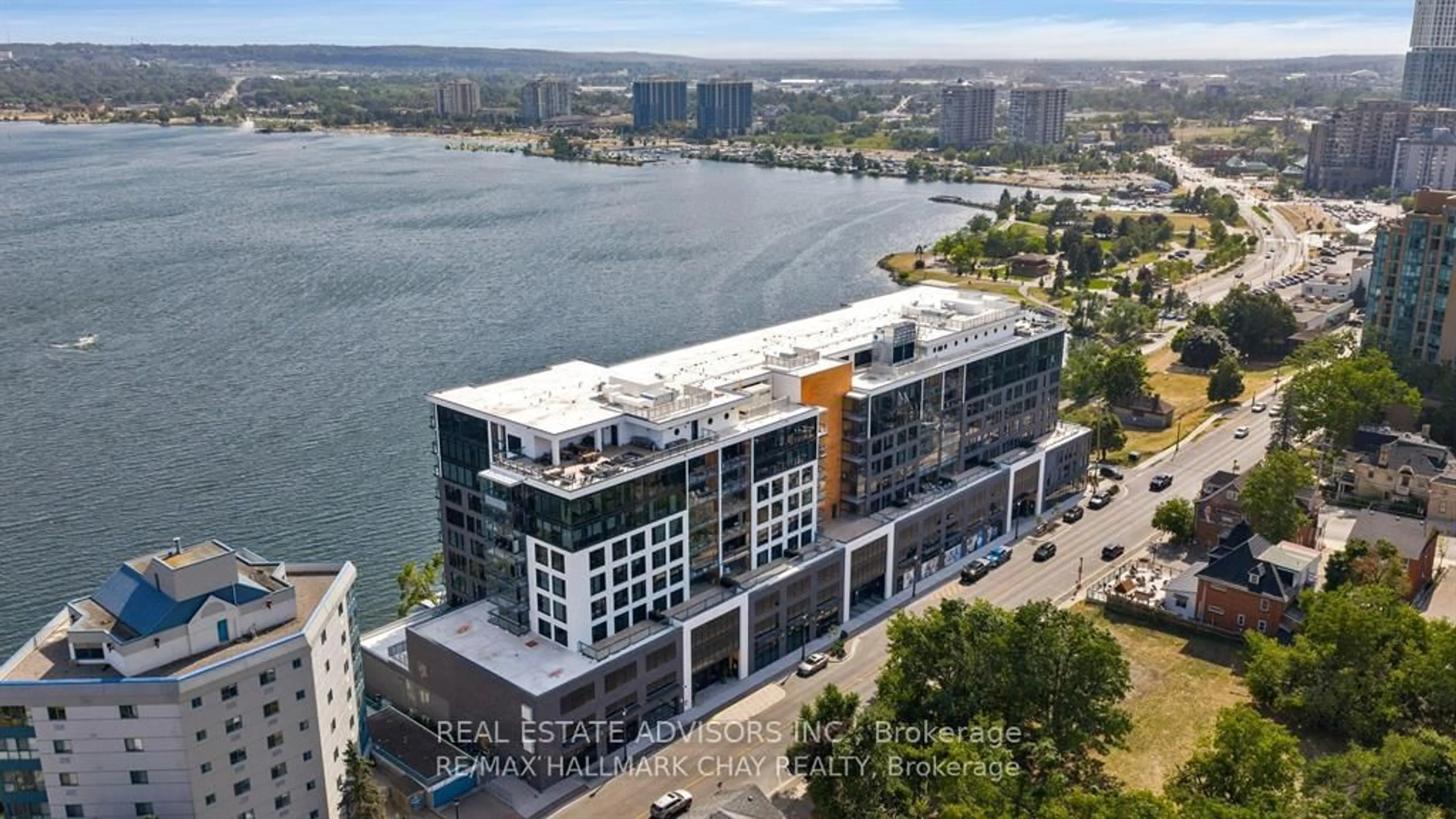 A pic from outside/outdoor area/front of a property/back of a property/a pic from drone, water/lake/river/ocean view for 185 Dunlop St #716, Barrie Ontario L4M 1B2