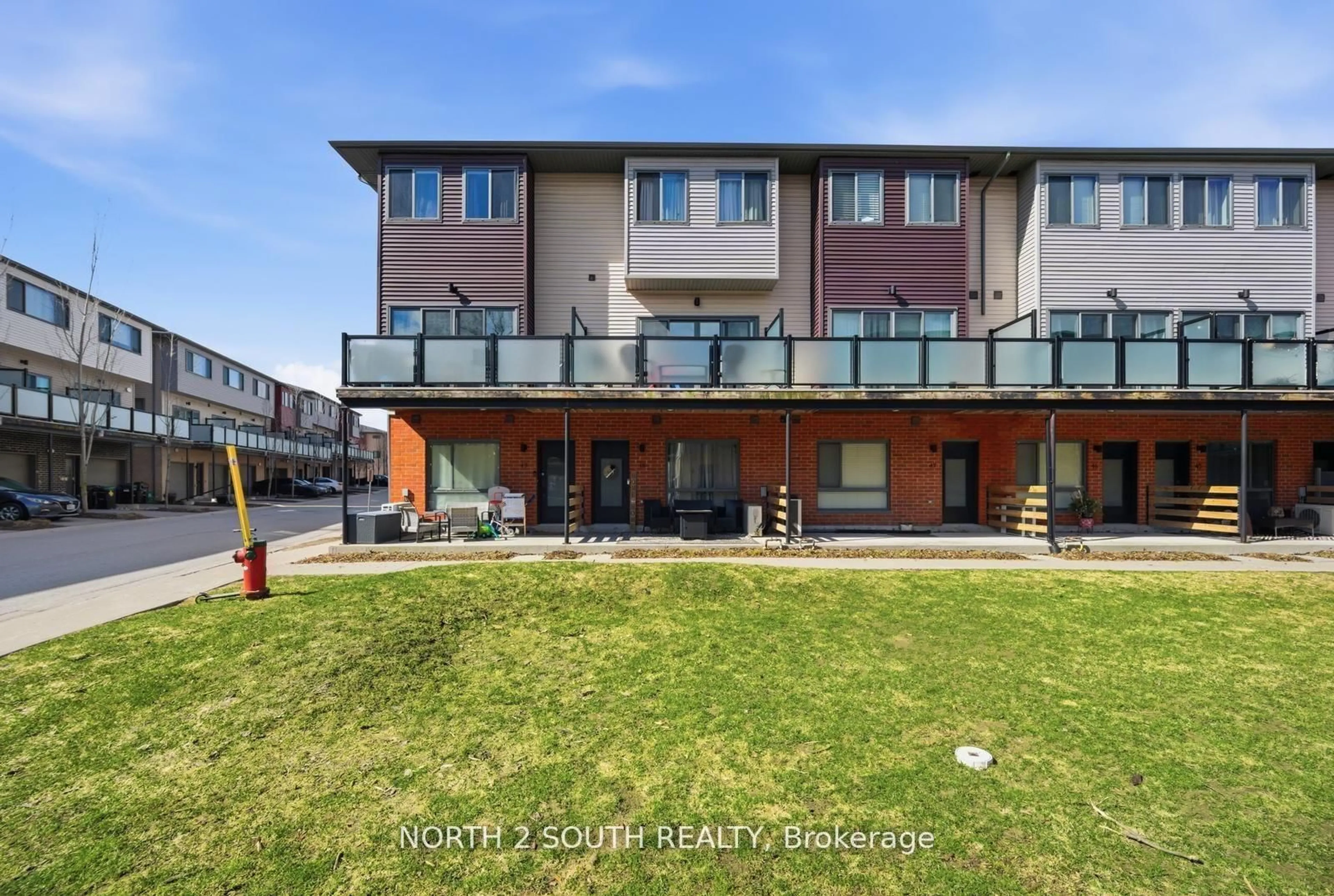 A pic from outside/outdoor area/front of a property/back of a property/a pic from drone, water/lake/river/ocean view for 369 Essa Rd #48, Barrie Ontario L4N 9C8