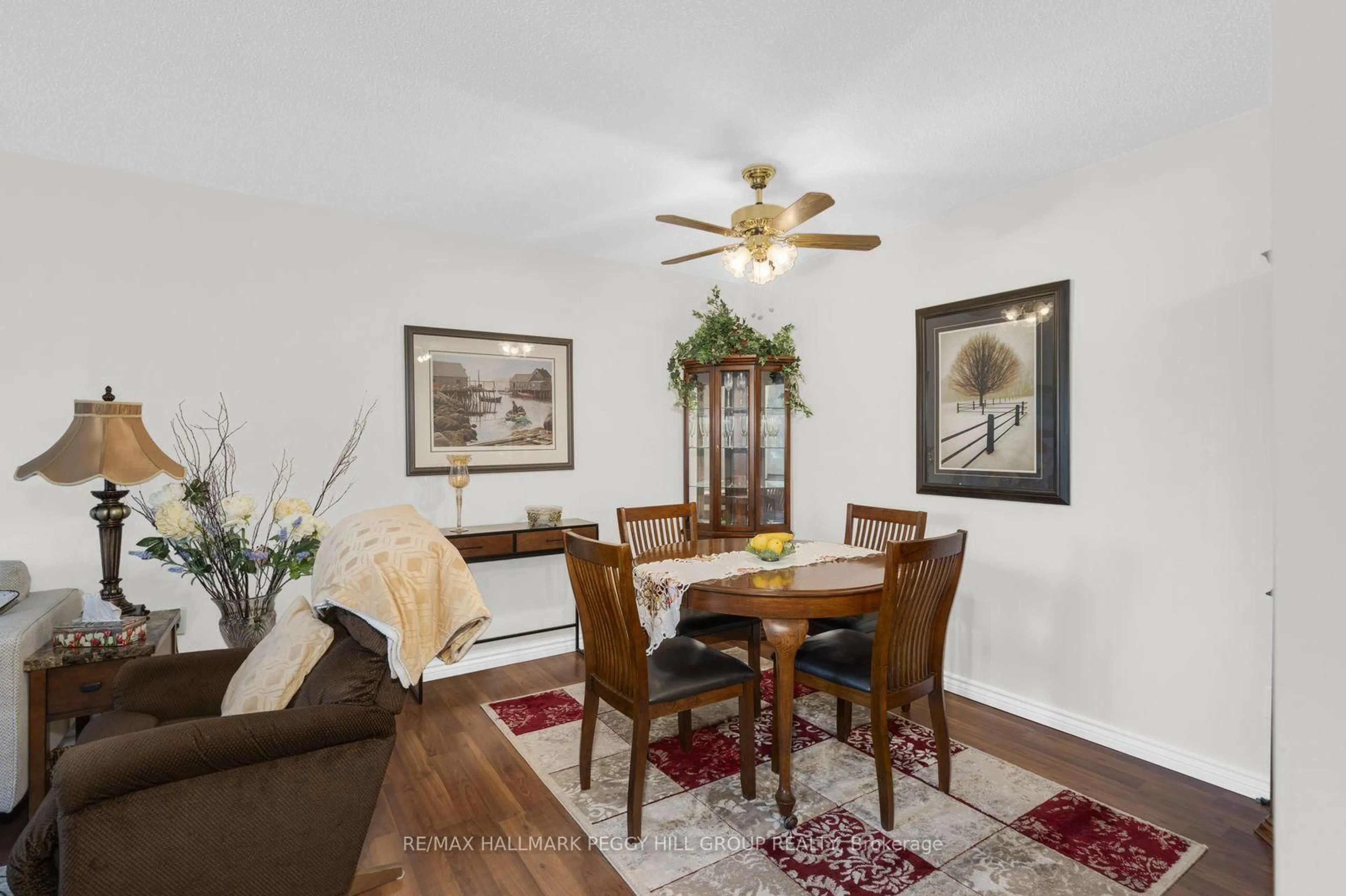 Dining room, wood/laminate floor for 10B Coulter St #211, Barrie Ontario L4N 6S1