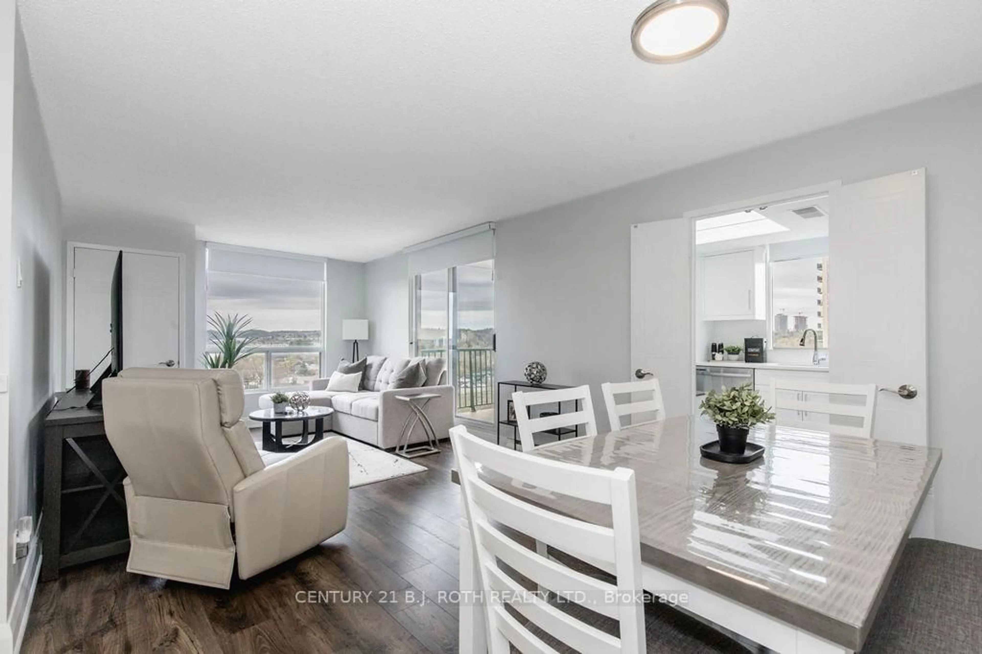 Living room with furniture, unknown for 75 Ellen St #1104, Barrie Ontario L4N 7R6
