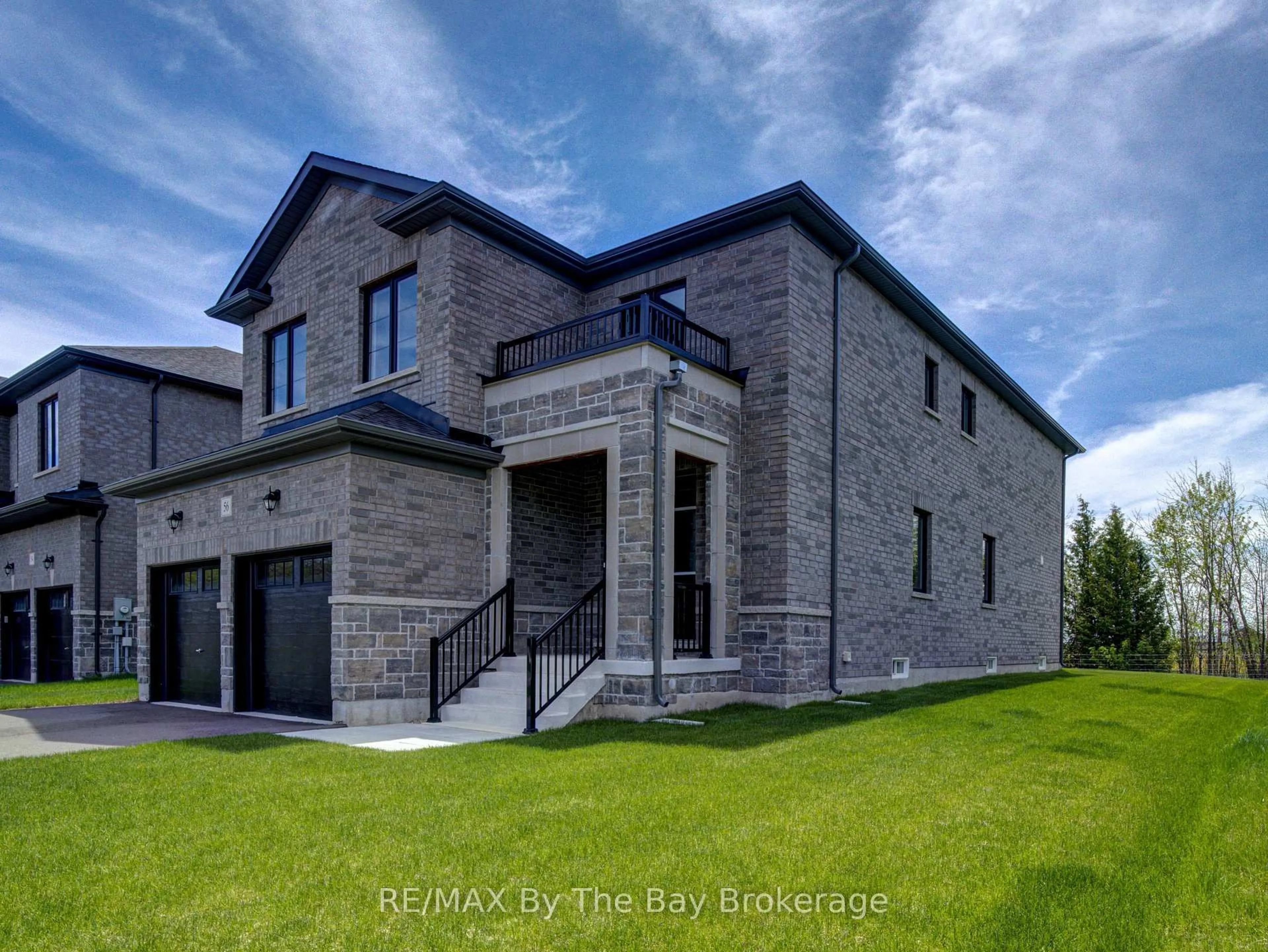Home with brick exterior material, building for 56 Amber Dr, Wasaga Beach Ontario L9Z 0R9