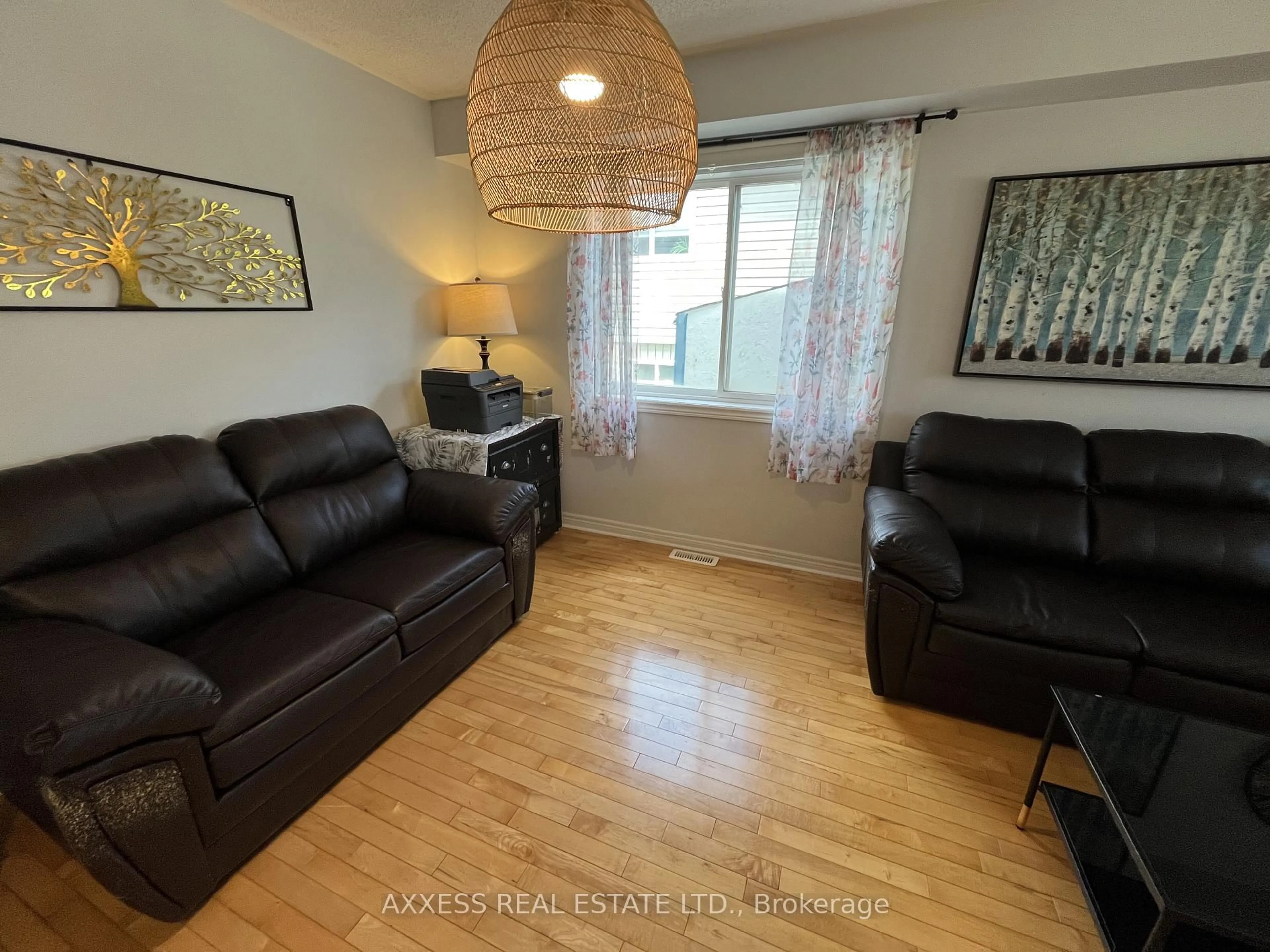 Living room with furniture, wood/laminate floor for 234 Esther Dr, Barrie Ontario L4N 0G3