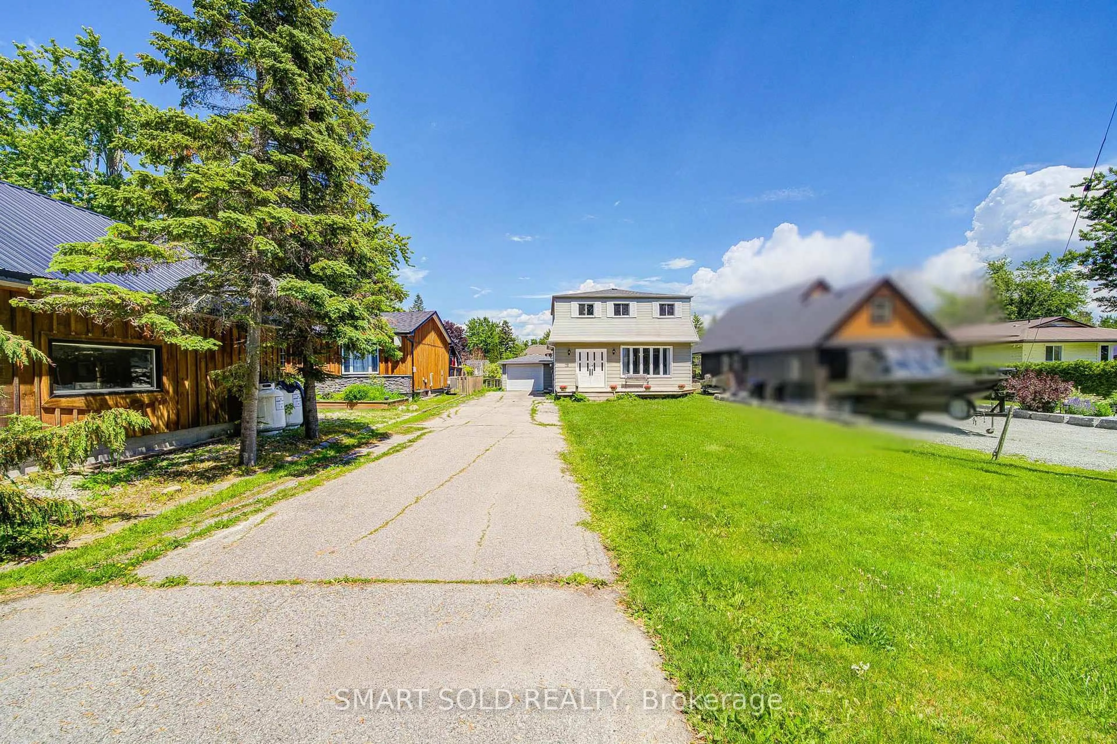 A pic from outside/outdoor area/front of a property/back of a property/a pic from drone, unknown for 75 Lake Ave, Ramara Ontario L0K 1B0