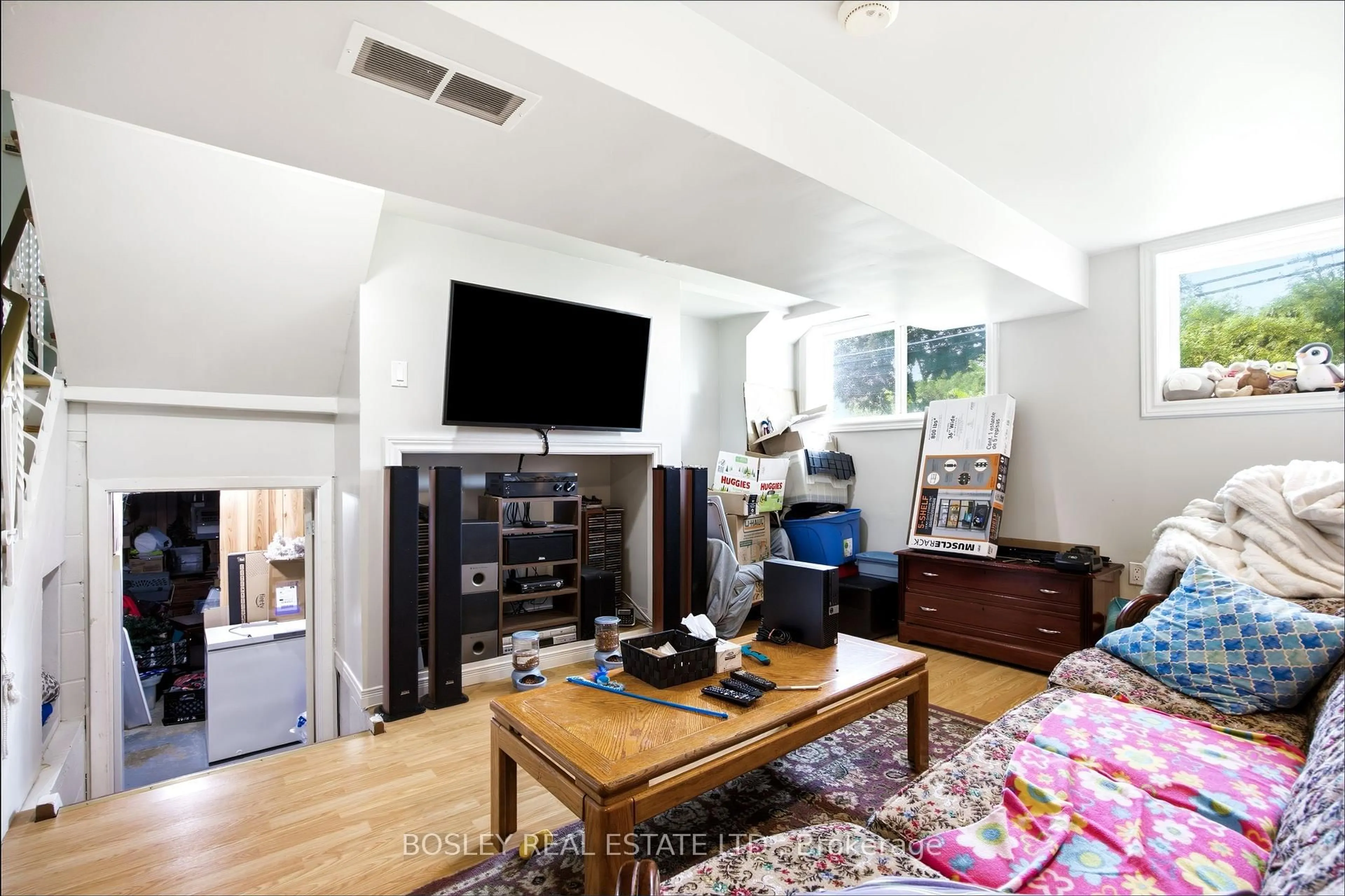 Living room with furniture, unknown for 16 Steel St, Barrie Ontario L4M 2E5