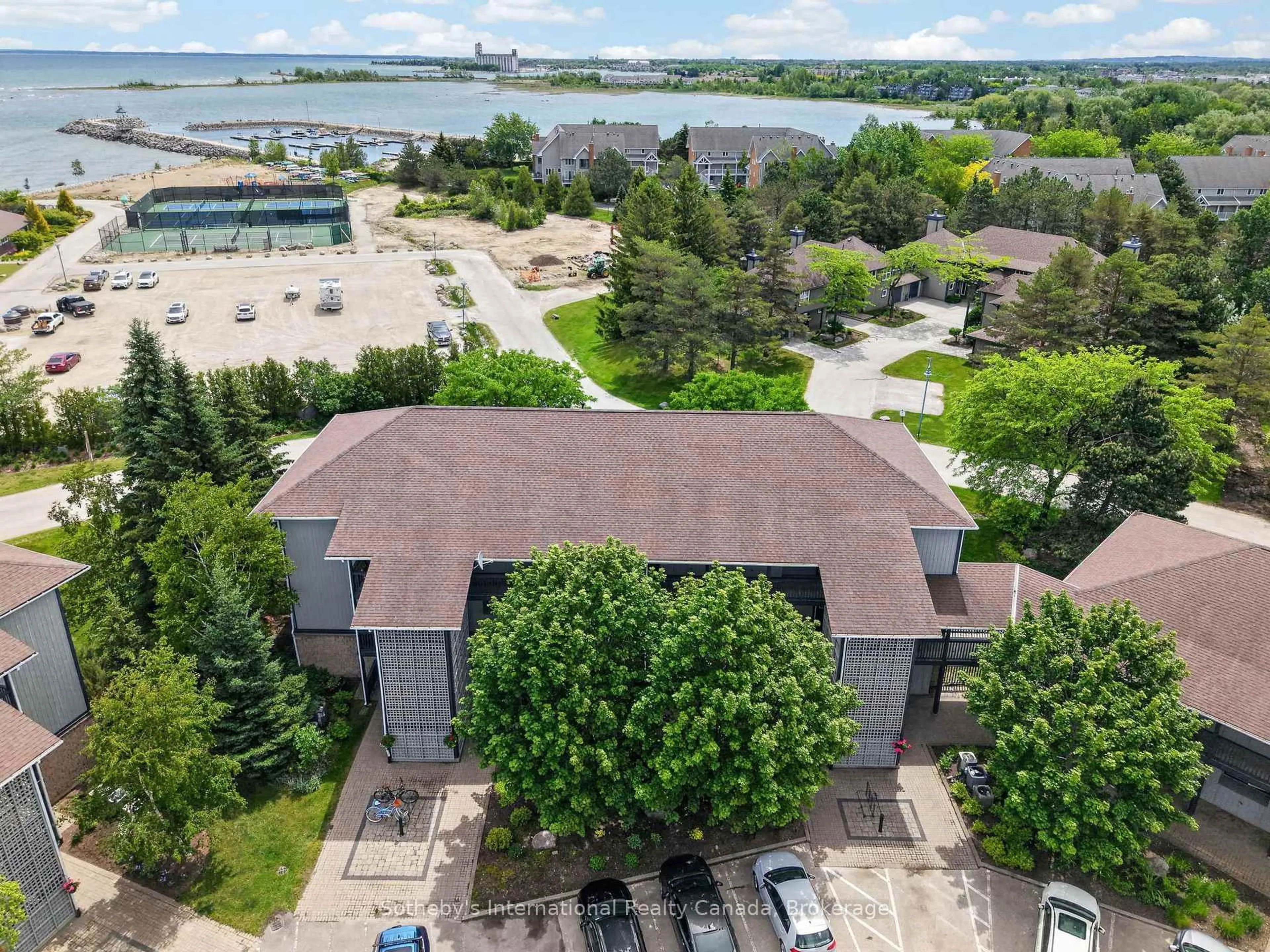 A pic from outside/outdoor area/front of a property/back of a property/a pic from drone, unknown for 441 Mariners Way, Collingwood Ontario L9Y 5C7