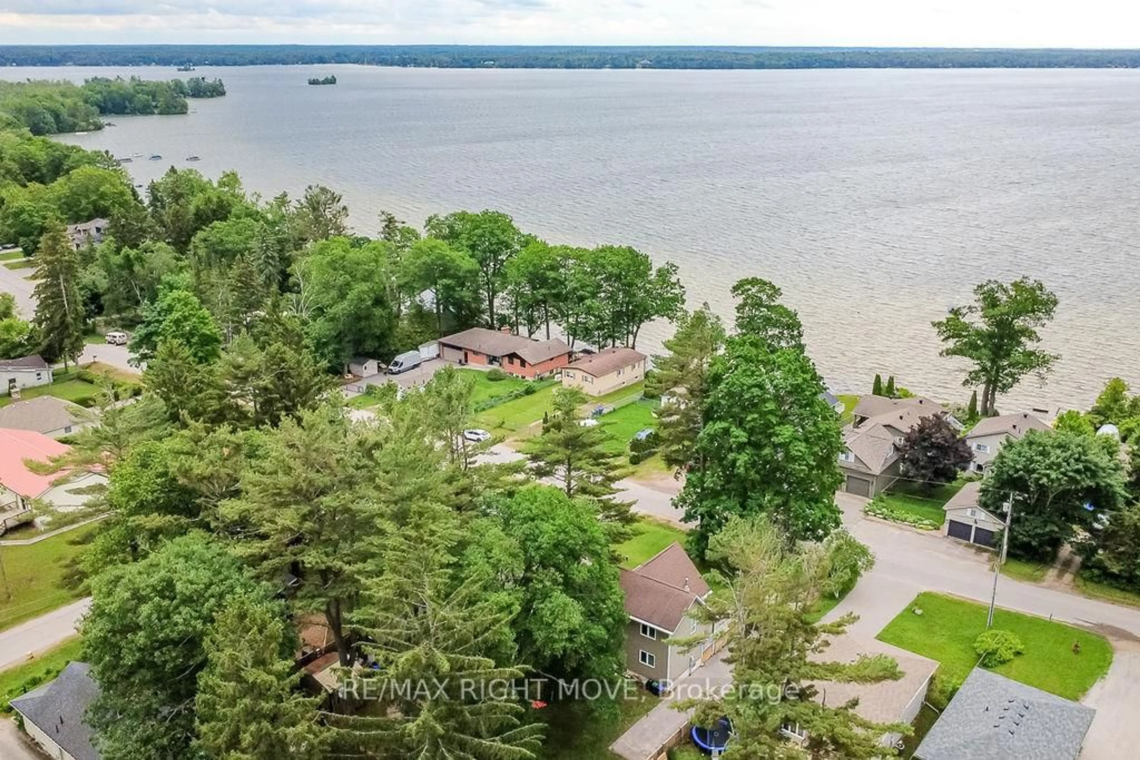 A pic from outside/outdoor area/front of a property/back of a property/a pic from drone, water/lake/river/ocean view for 2956 Lakeside Dr, Severn Ontario L3V 0V9