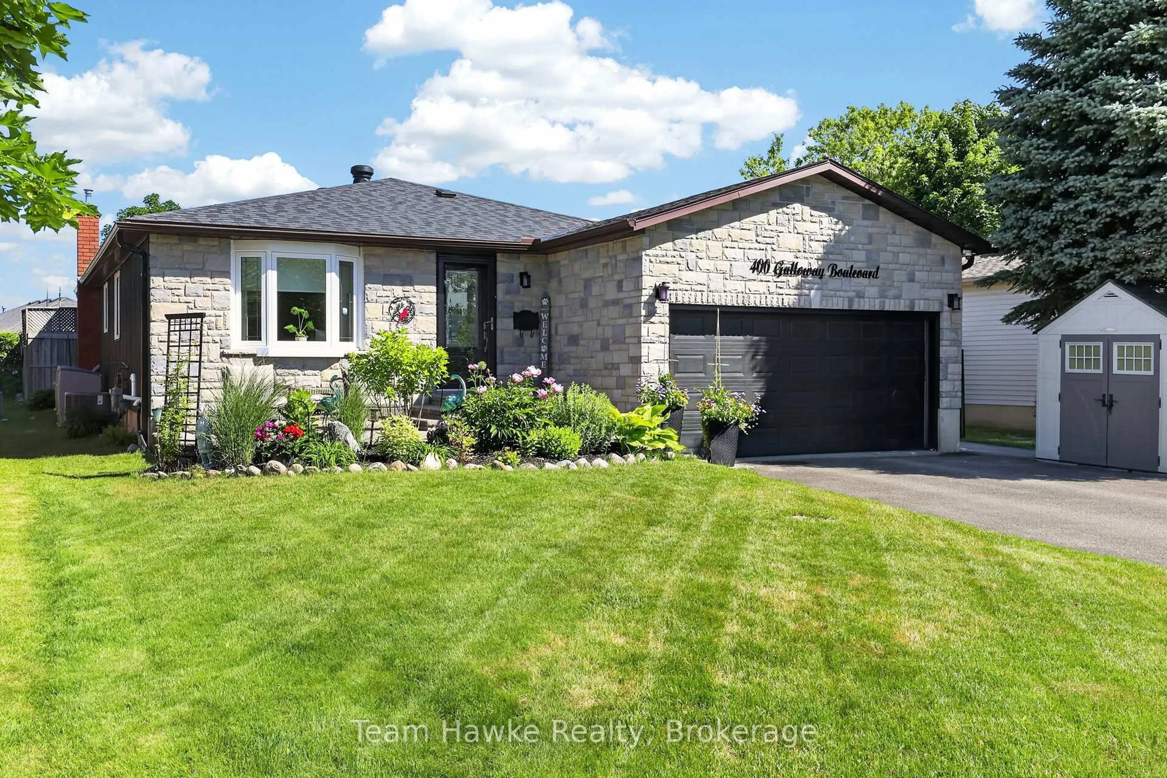 Home with brick exterior material, street for 400 Galloway Blvd, Midland Ontario L4R 5C2
