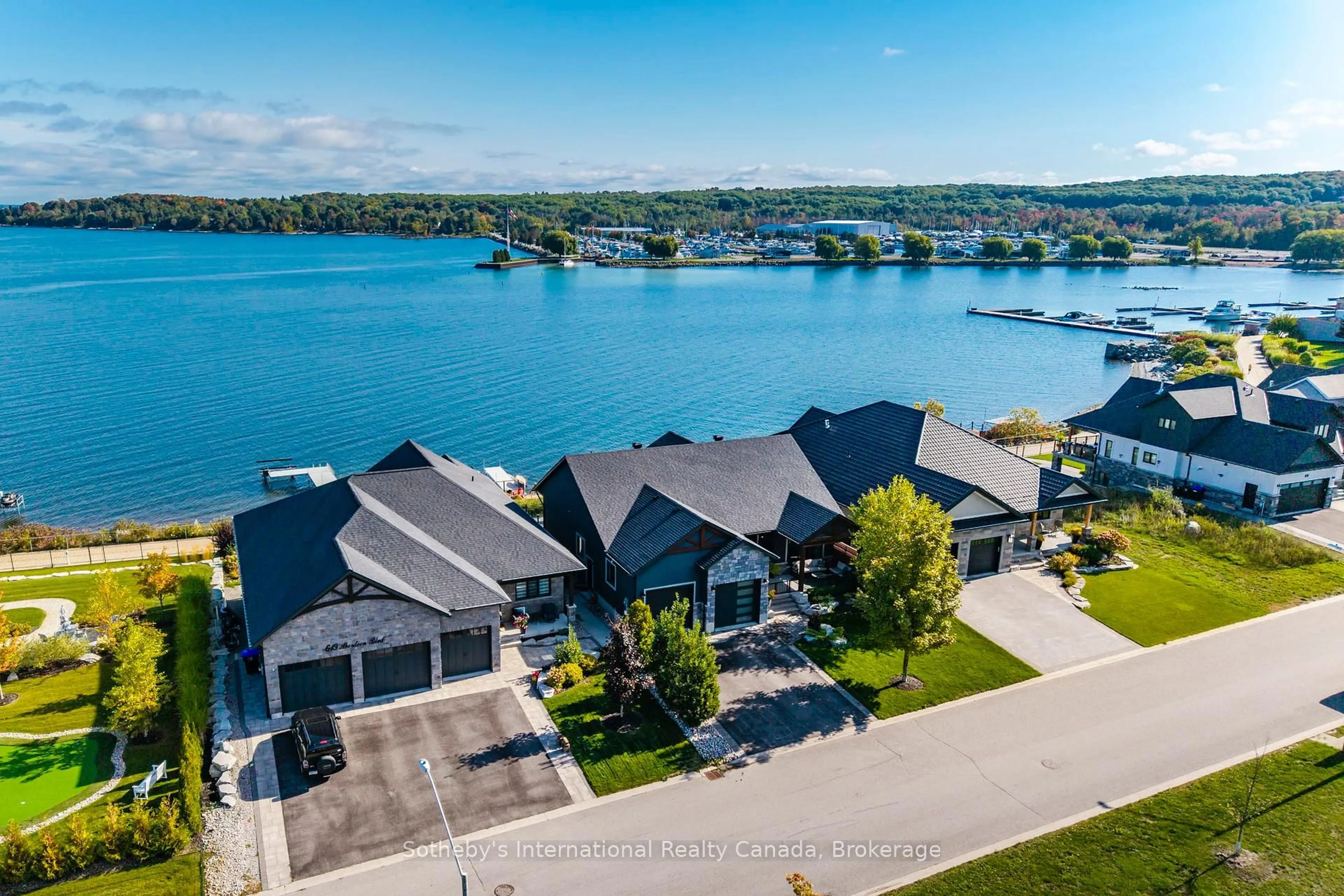 A pic from outside/outdoor area/front of a property/back of a property/a pic from drone, water/lake/river/ocean view for 625 Aberdeen Blvd, Midland Ontario L4R 5L9
