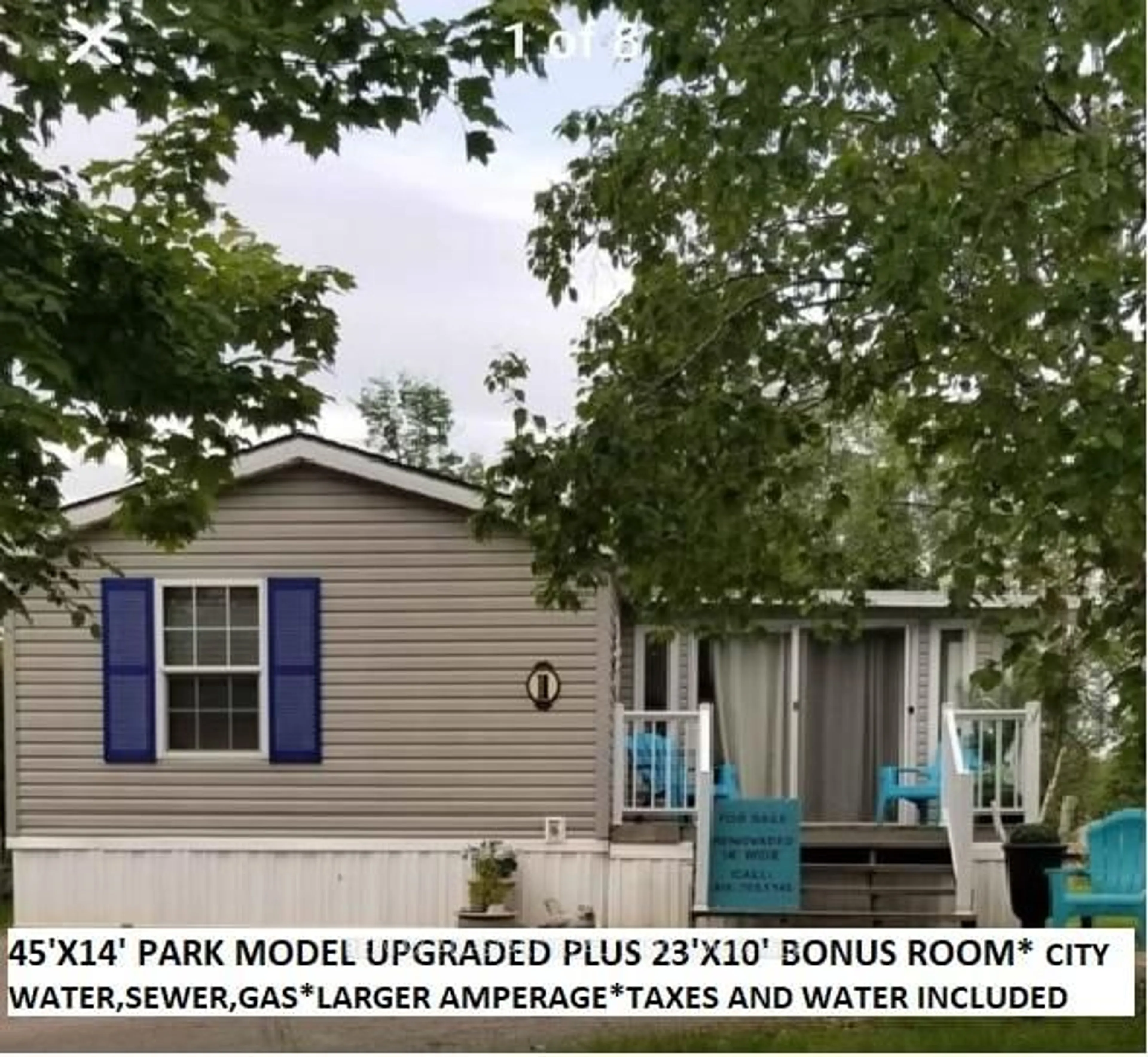 Home with vinyl exterior material, street for 1 KENORA Tr, Wasaga Beach Ontario L9Z 1X7