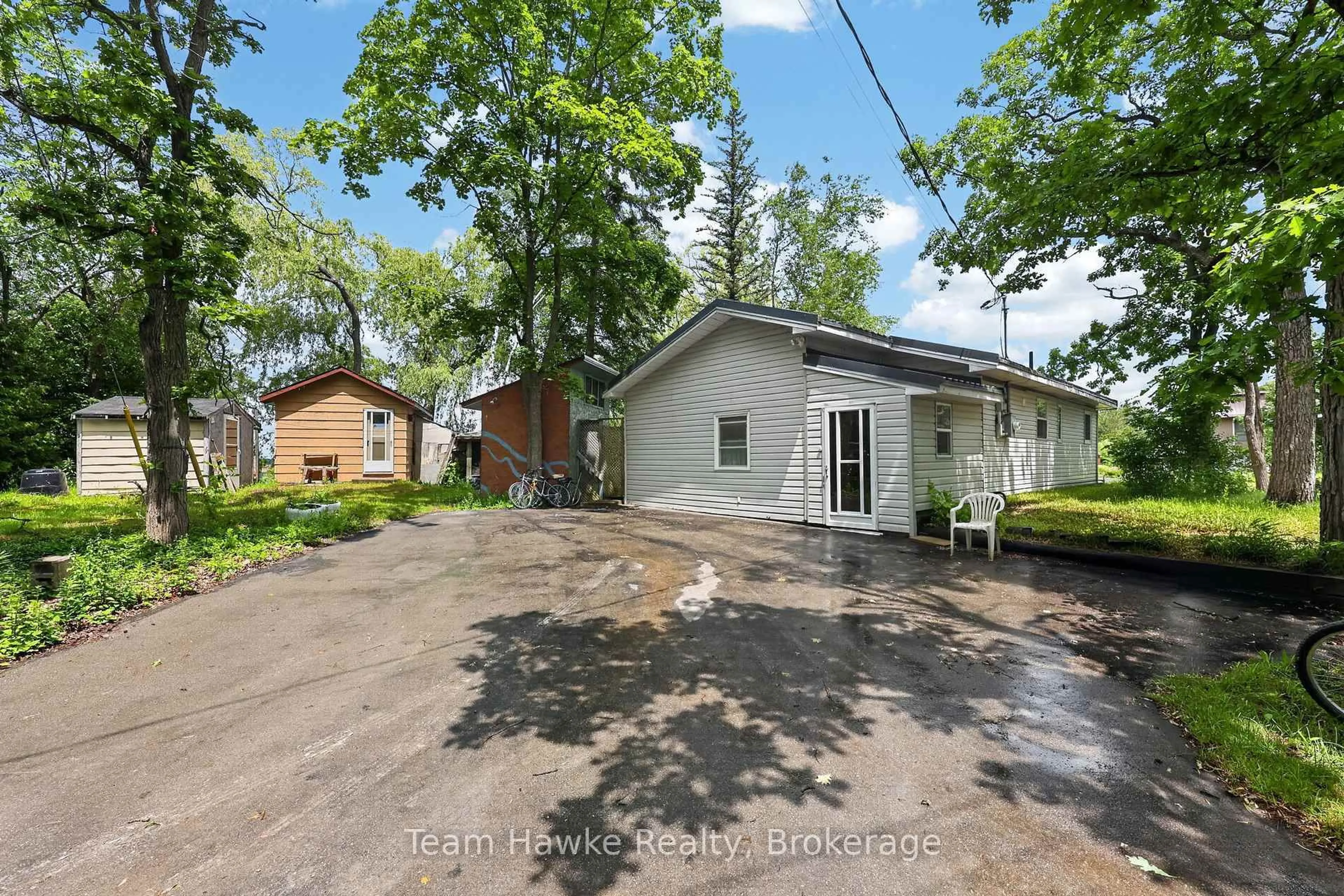 A pic from outside/outdoor area/front of a property/back of a property/a pic from drone, street for 32 Long Point Rd, Tay Ontario L0K 2C0