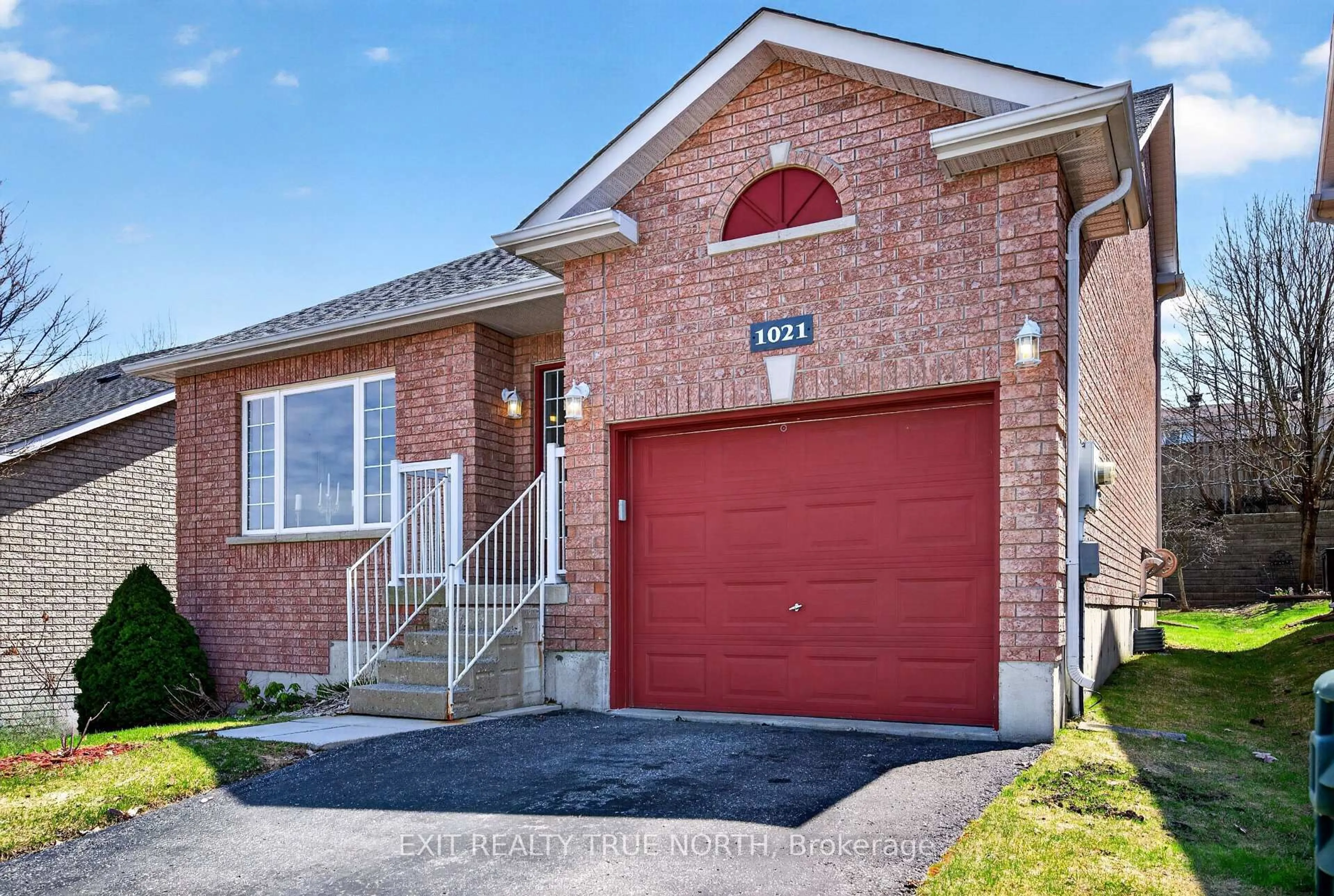Home with brick exterior material, street for 1021 Whitney Cres, Midland Ontario L4R 5N3