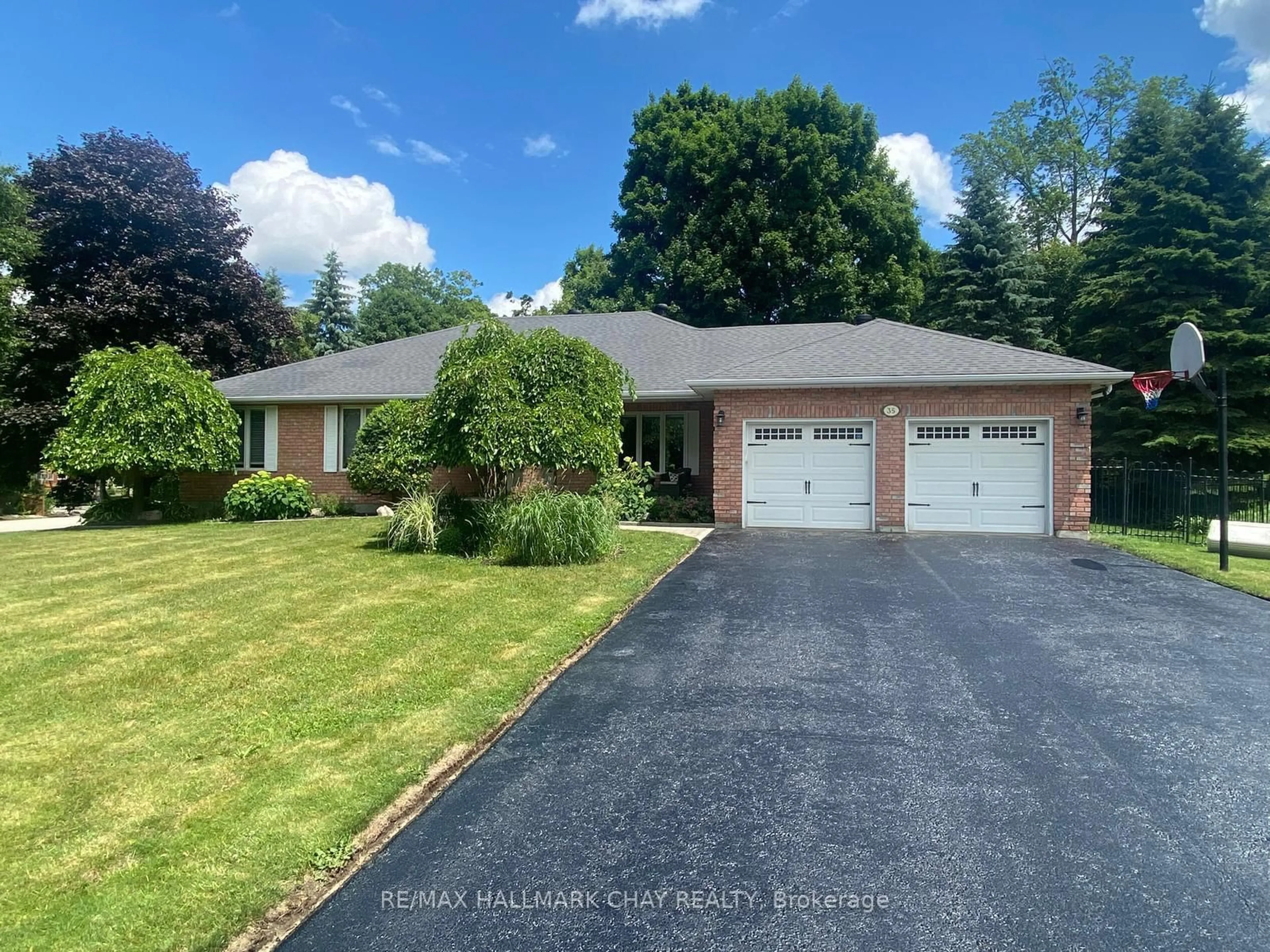 A pic from outside/outdoor area/front of a property/back of a property/a pic from drone, unknown for 35 Eder Tr, Springwater Ontario L0L 1Y3