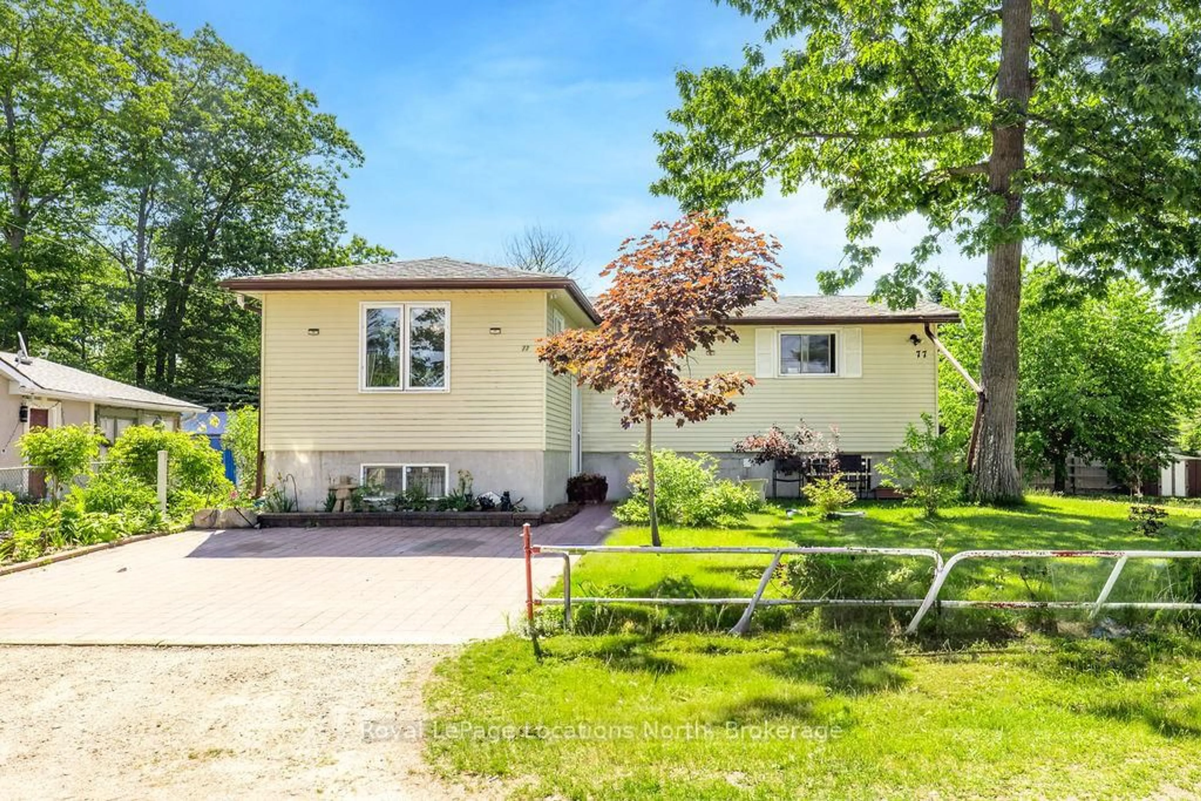 Home with vinyl exterior material, street for 77 Laidlaw St, Wasaga Beach Ontario L9Z 2L2