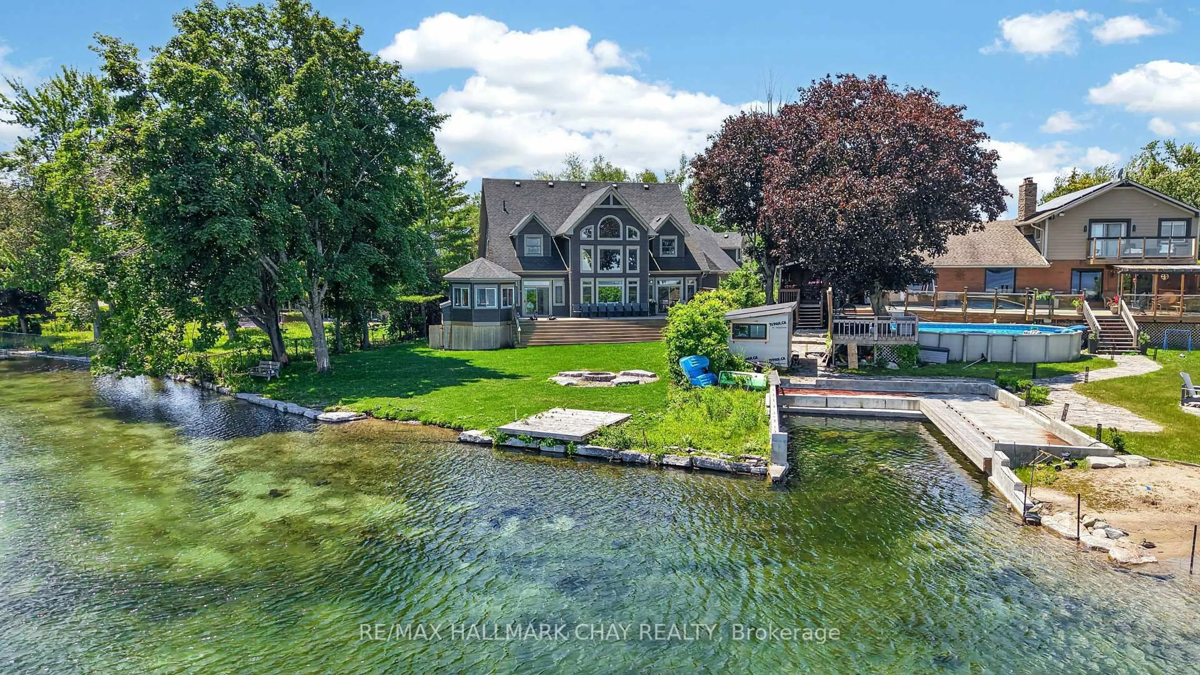 A pic from outside/outdoor area/front of a property/back of a property/a pic from drone, water/lake/river/ocean view for 465 Mooney Cres, Orillia Ontario L3V 6R5