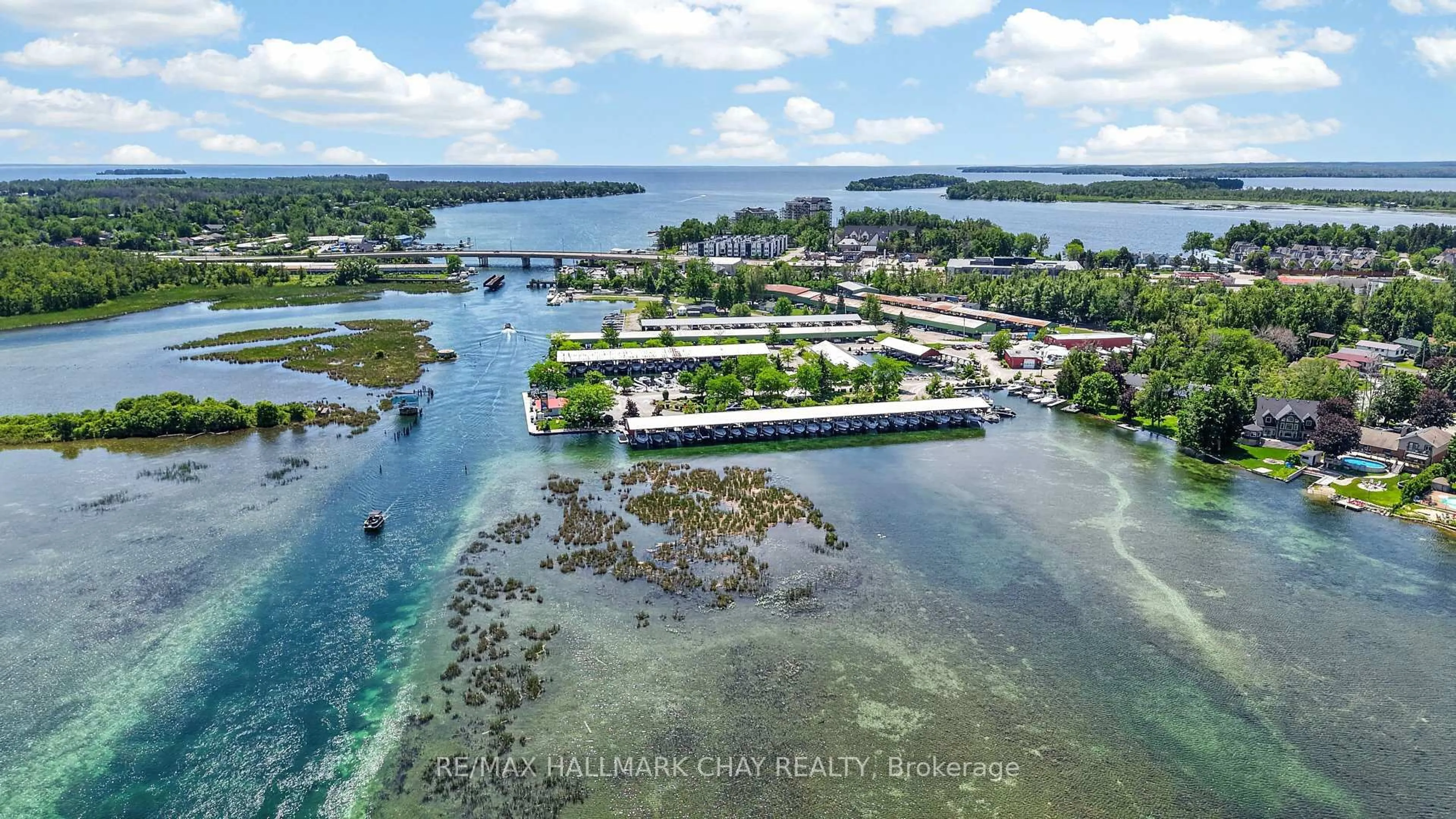 A pic from outside/outdoor area/front of a property/back of a property/a pic from drone, water/lake/river/ocean view for 465 Mooney Cres, Orillia Ontario L3V 6R5