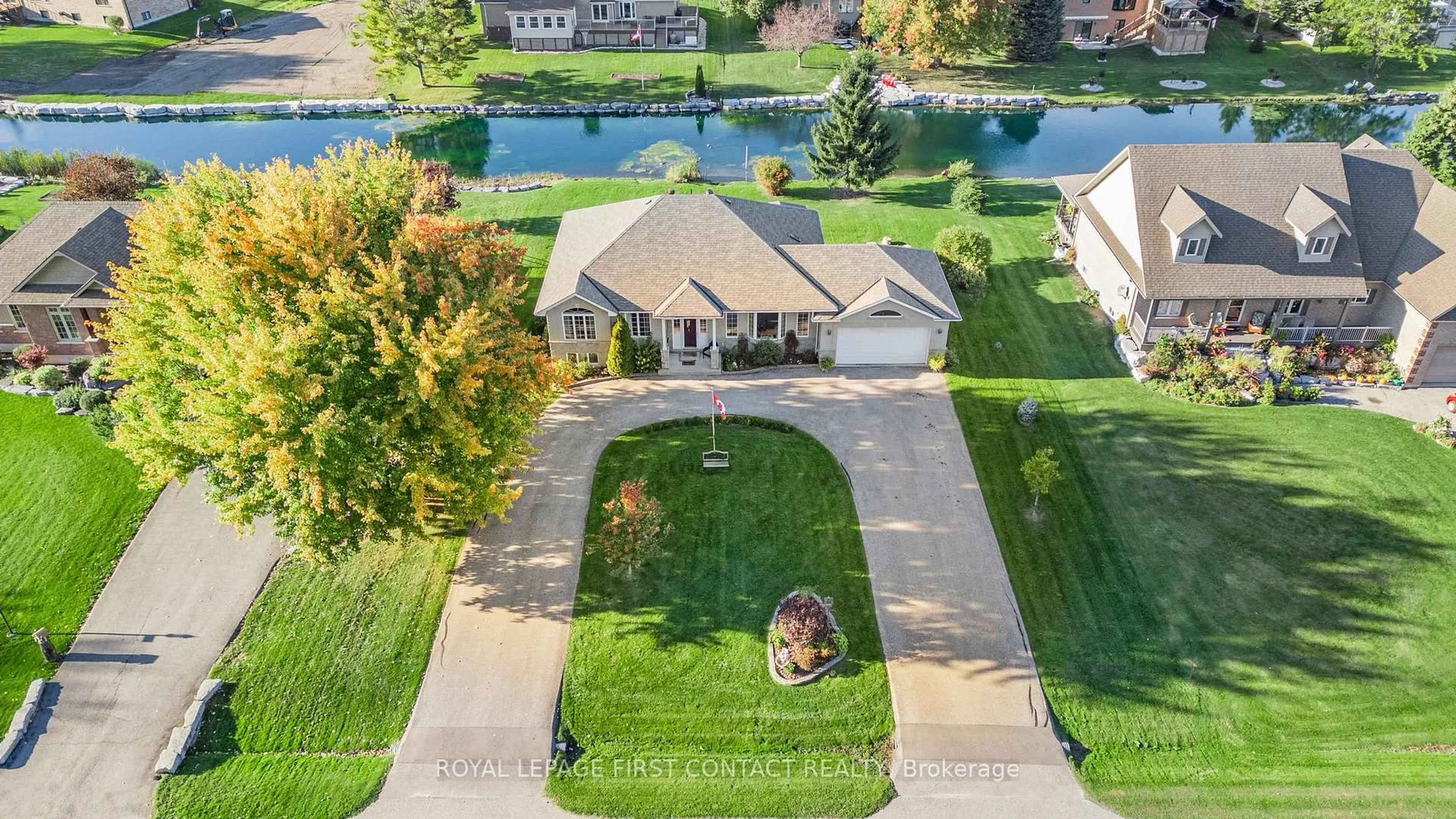 A pic from outside/outdoor area/front of a property/back of a property/a pic from drone, water/lake/river/ocean view for 93 Bayshore Dr, Ramara Ontario L0K 1B0